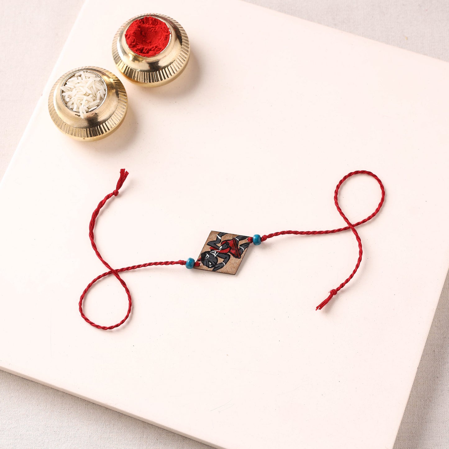 Pattachitra Handpainted Wooden Rakhi 83