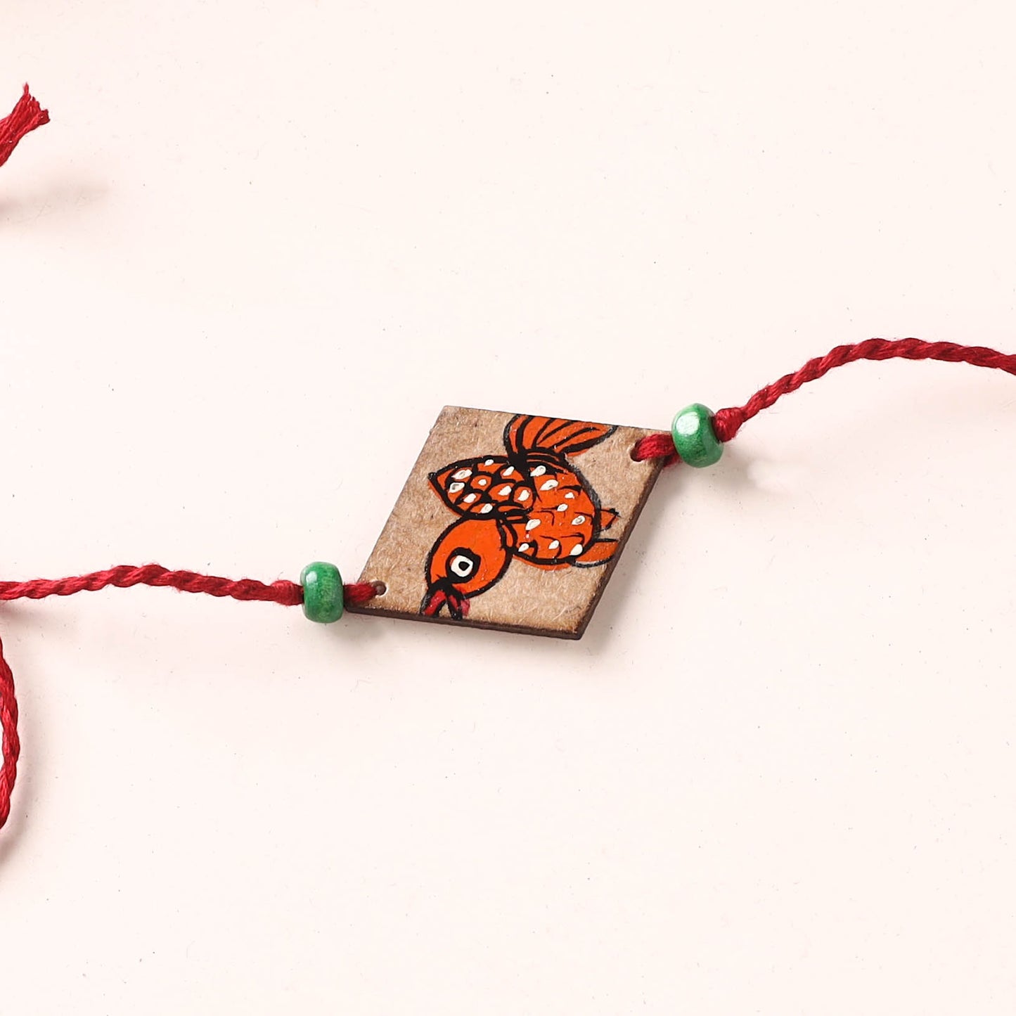 Pattachitra Handpainted Wooden Rakhi 82