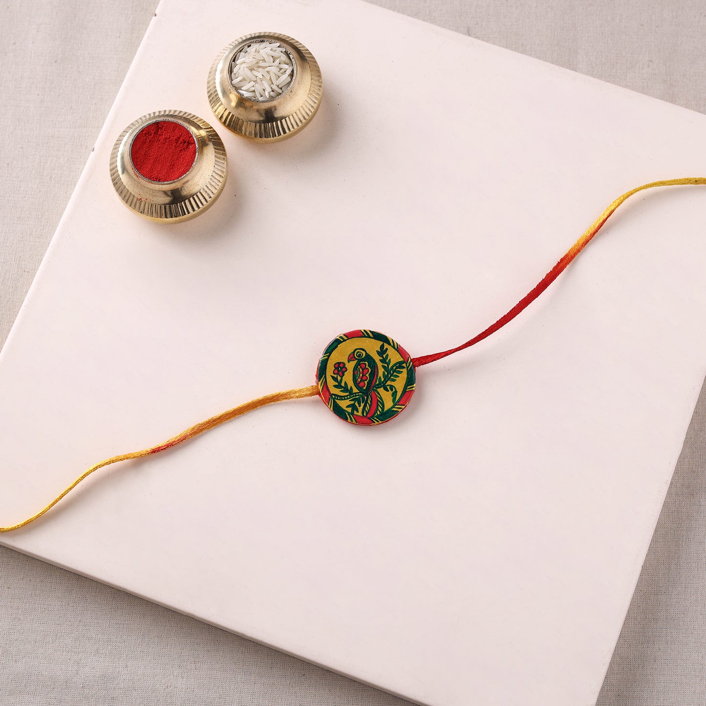Manjusha Art Handpainted Resin Rakhi 06