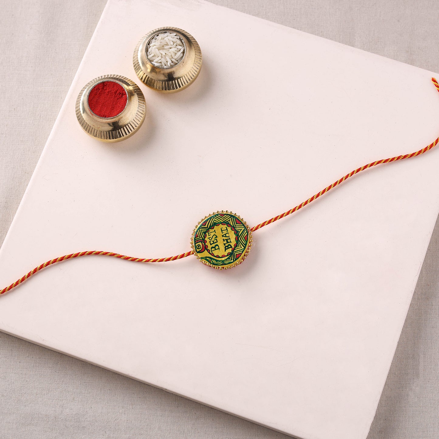 Manjusha Art Handpainted Resin Rakhi 40