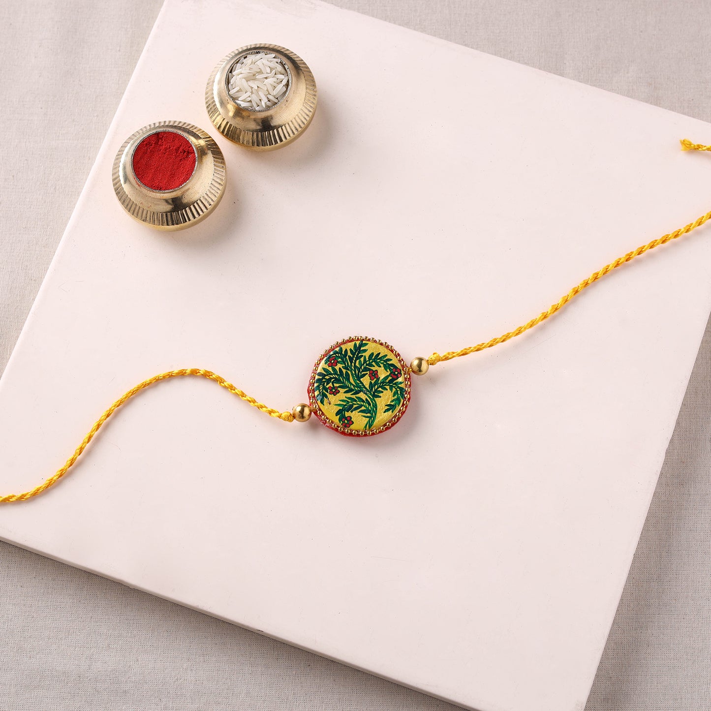 Manjusha Art Handpainted Resin Rakhi 48