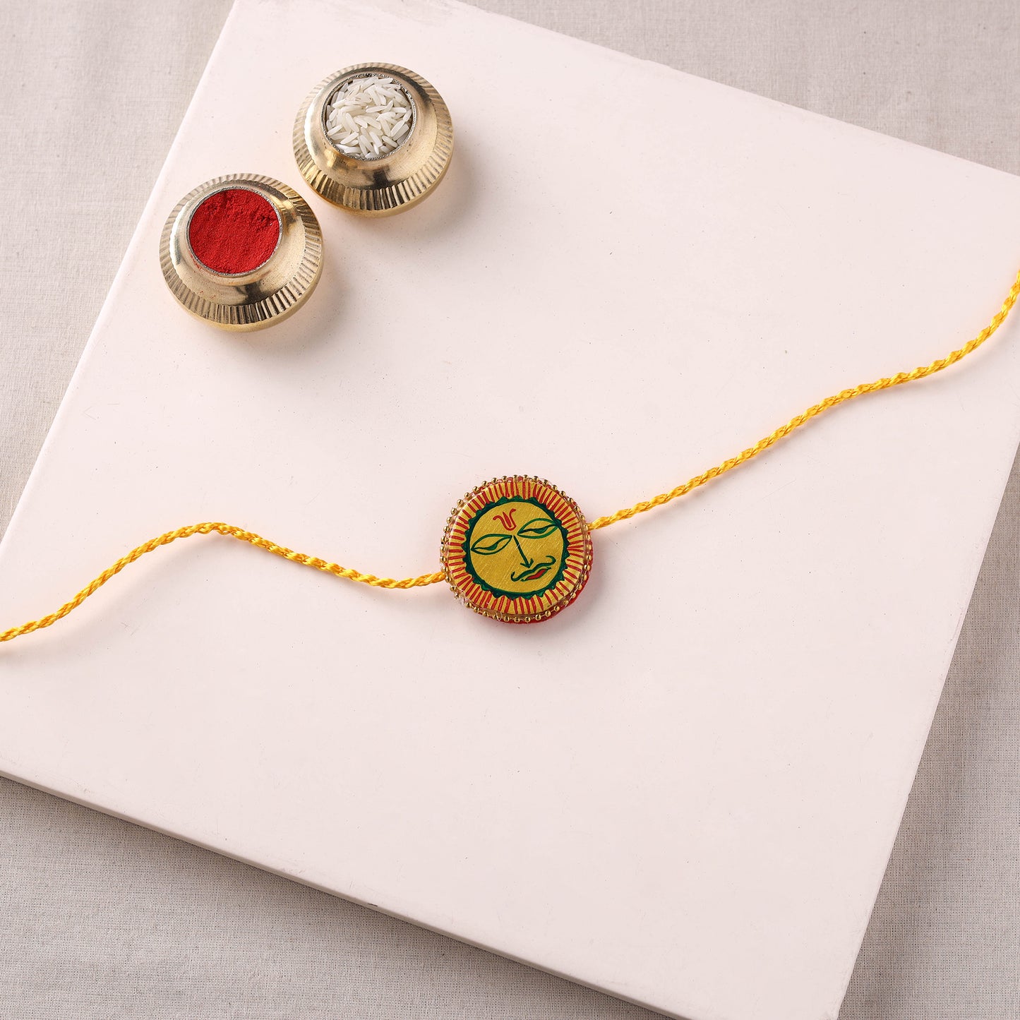 Manjusha Art Handpainted Resin Rakhi 50