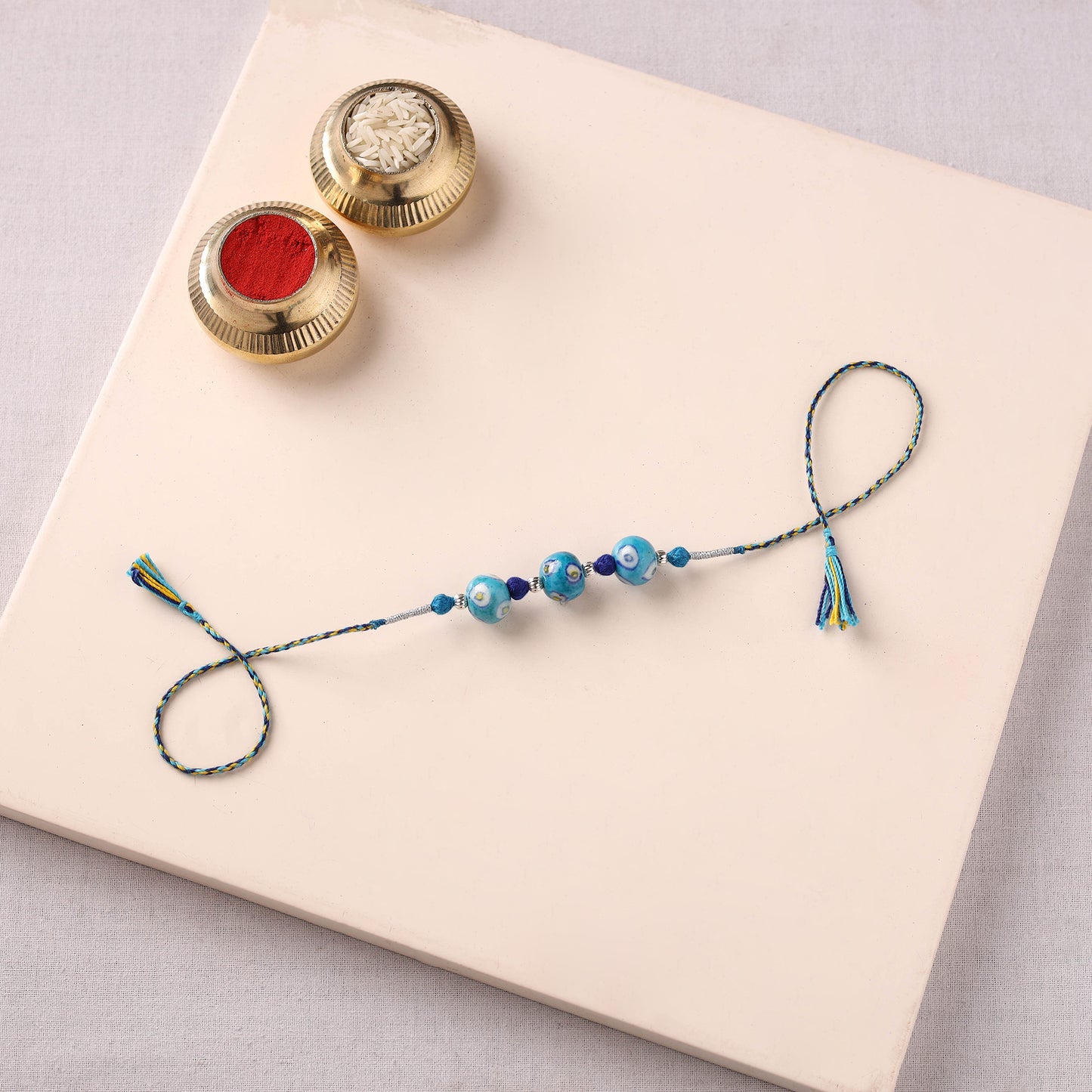 Handcrafted Patwa Threadwork Blue Pottery Beads Rakhi 11