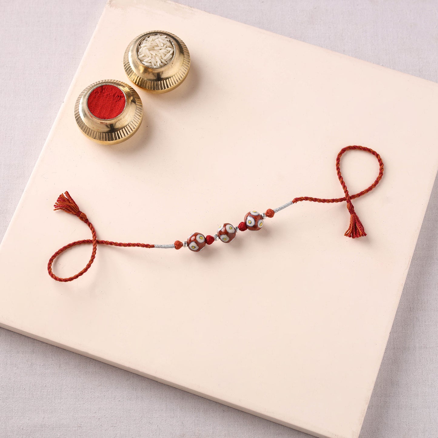 Handcrafted Patwa Threadwork Blue Pottery Beads Rakhi 14