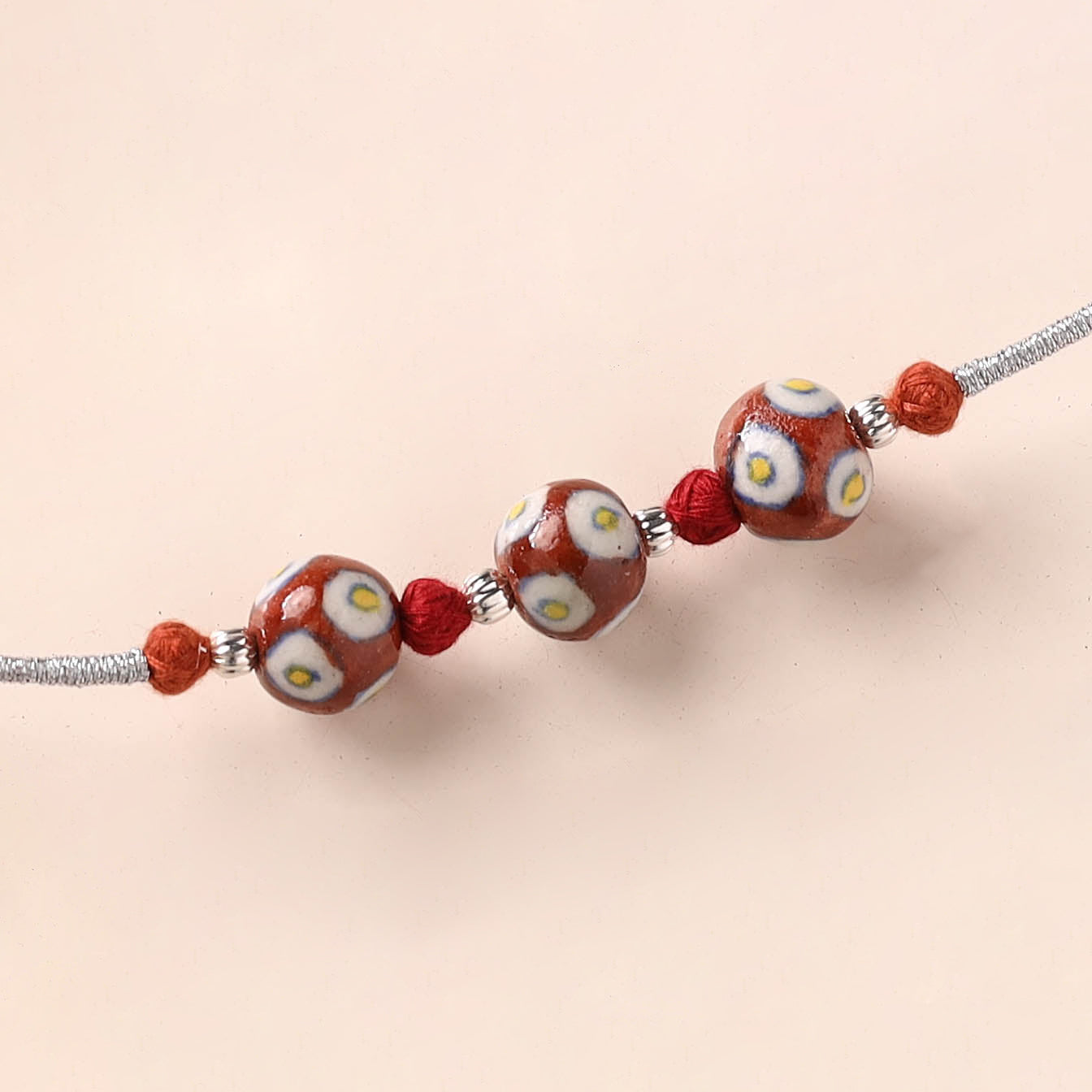 Handcrafted Patwa Threadwork Blue Pottery Beads Rakhi 14