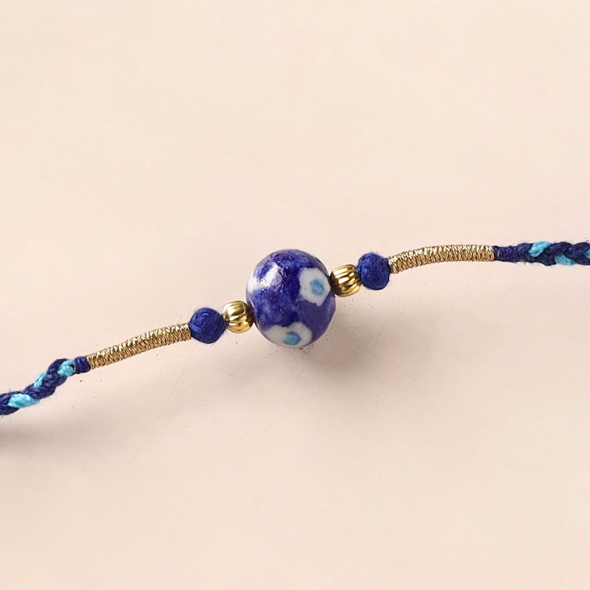 Handcrafted Patwa Threadwork Blue Pottery Beads Rakhi 27