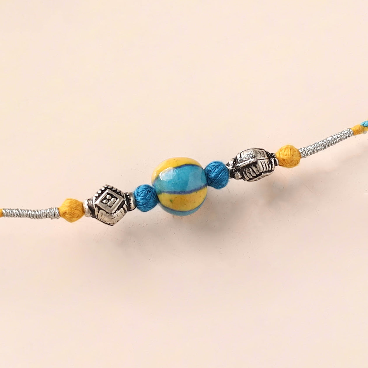 Handcrafted Patwa Threadwork Blue Pottery Beads Rakhi 32