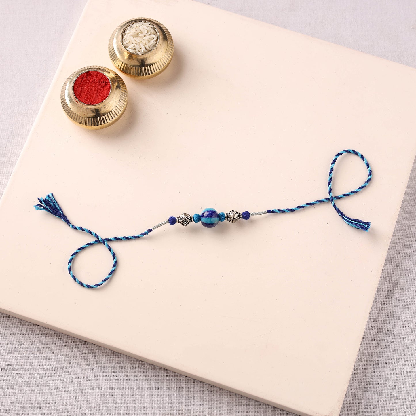 Handcrafted Patwa Threadwork Blue Pottery Beads Rakhi 35