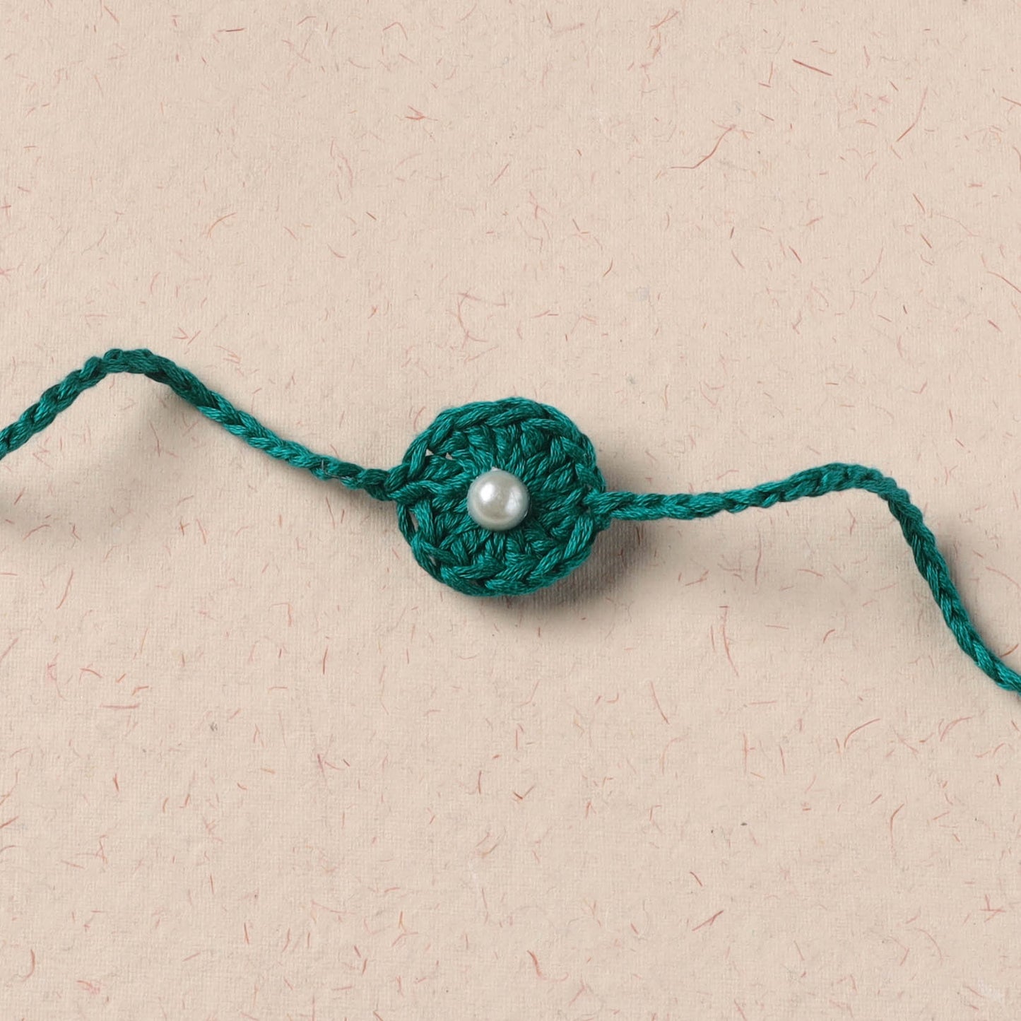 Flower - Handmade Crochet Pearl Work Rakhi 01