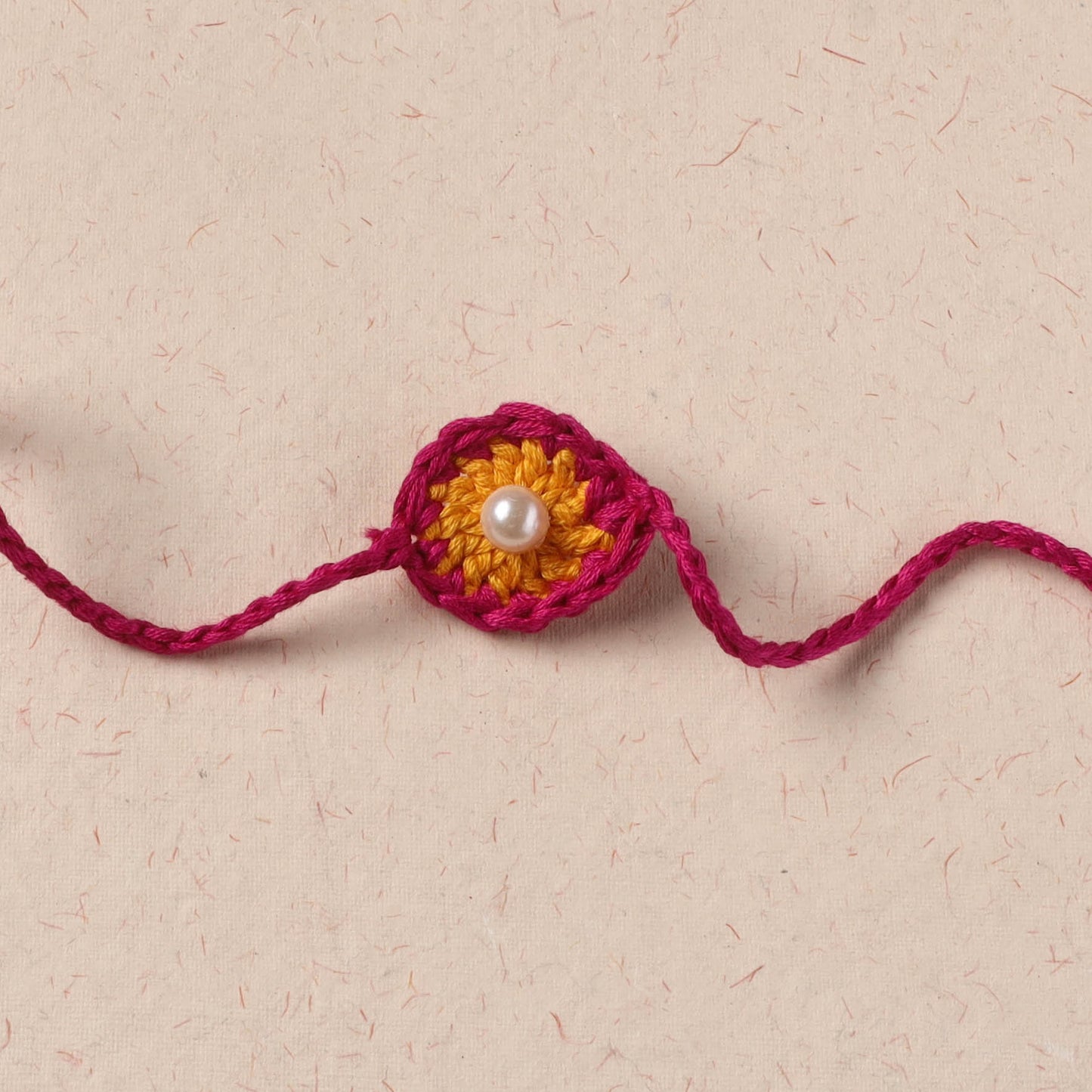 Handmade Crochet Pearl Work Rakhi 15