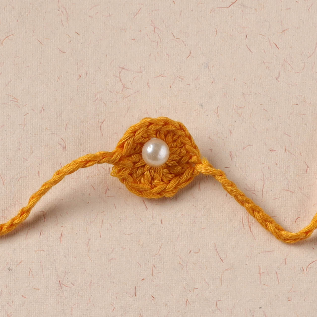 Flower - Handmade Crochet Pearl Work Rakhi 25