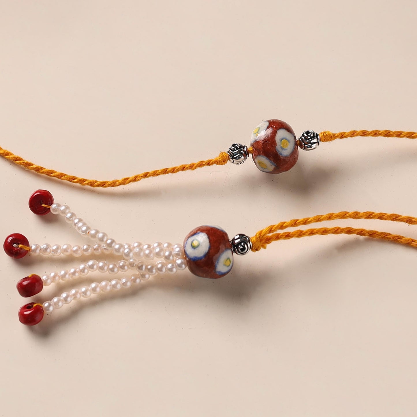 Handmade Blue Pottery & GS Bead Work Rakhi Lumba Set 30