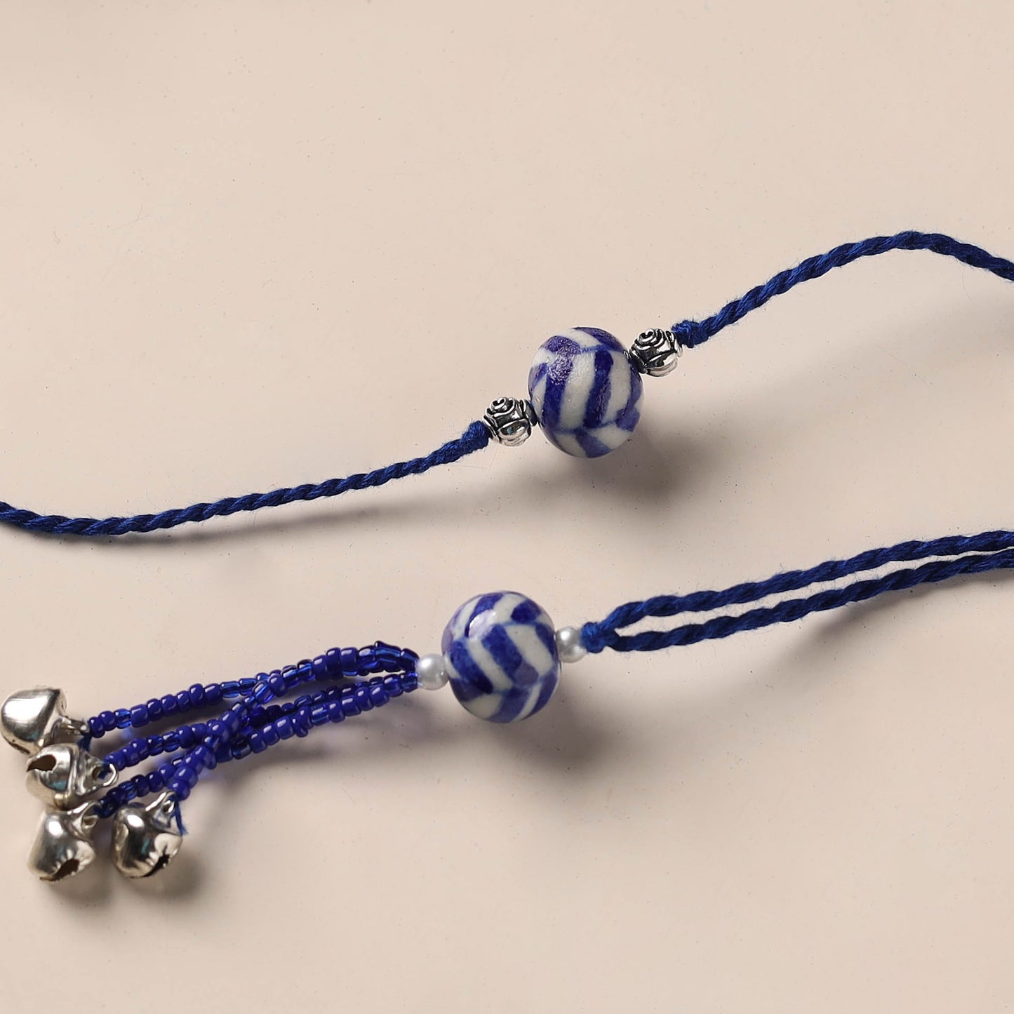 Handmade Blue Pottery & GS Bead Work Rakhi Lumba Set 36