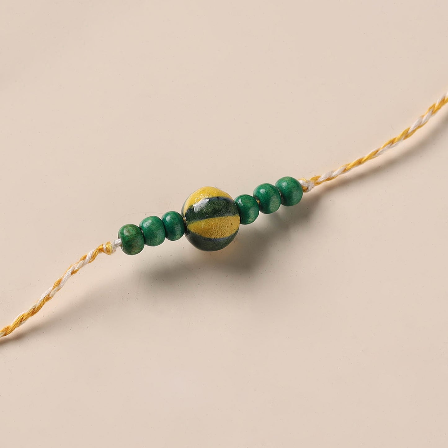 Handmade Blue Pottery & GS Bead Work Rakhi 09