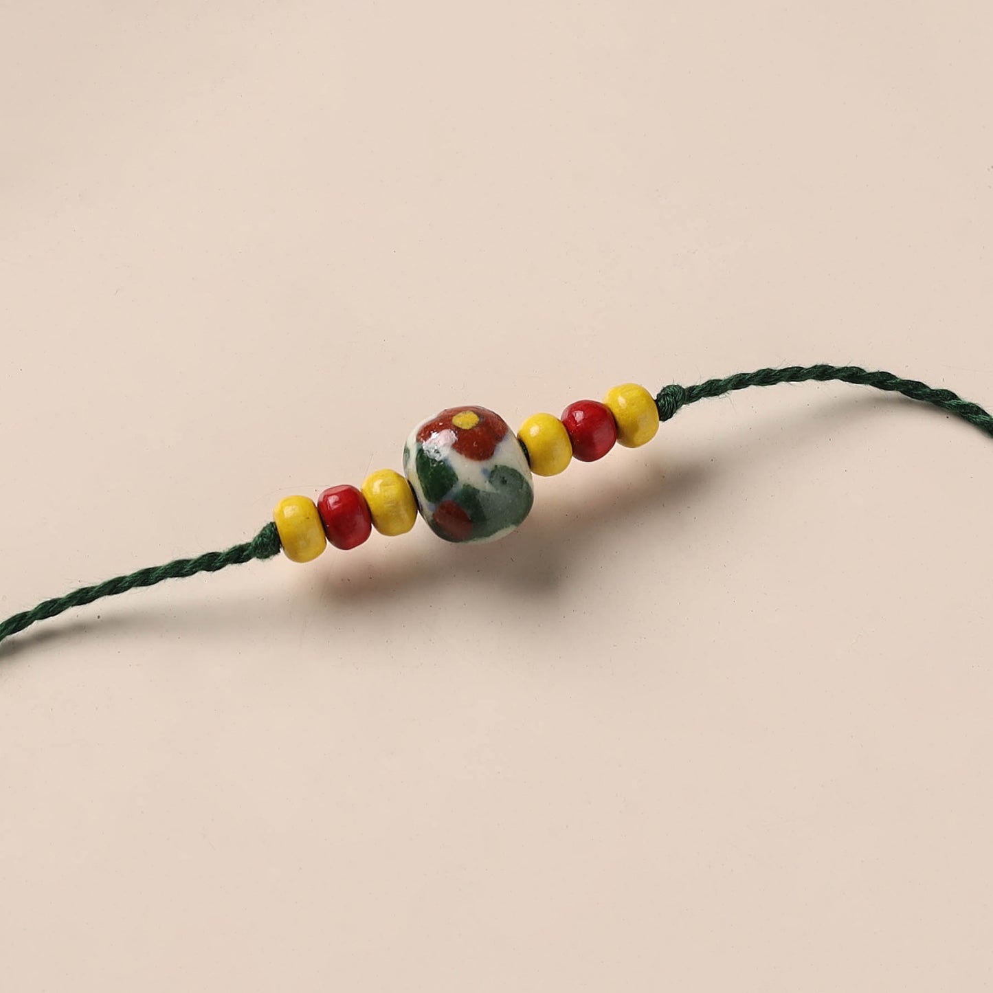 Handmade Blue Pottery & GS Bead Work Rakhi 11
