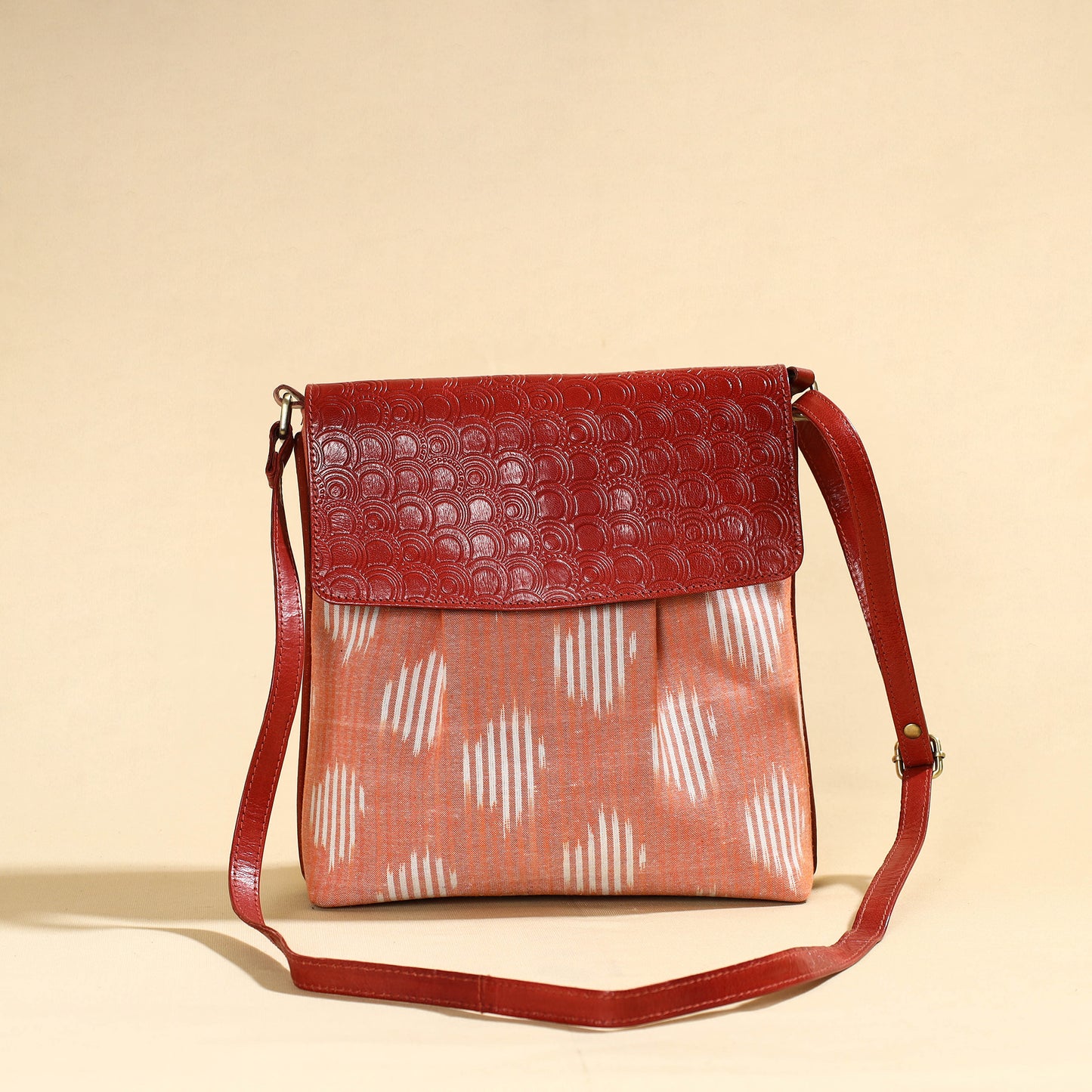 Peach - Handcrafted Ikat Fabric Sling Bag with Embossed Leather Flap