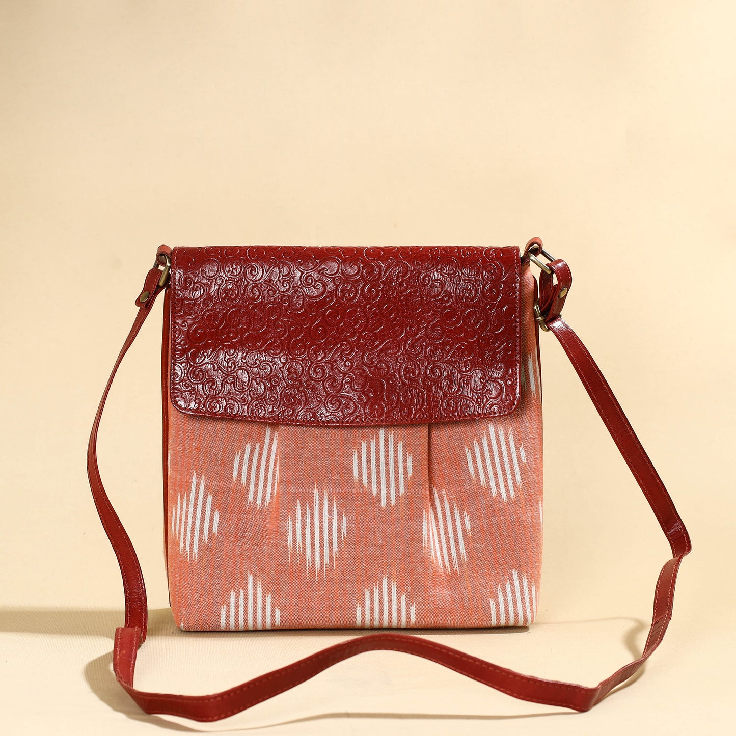 Peach - Handcrafted Ikat Fabric Sling Bag with Embossed Leather Flap
