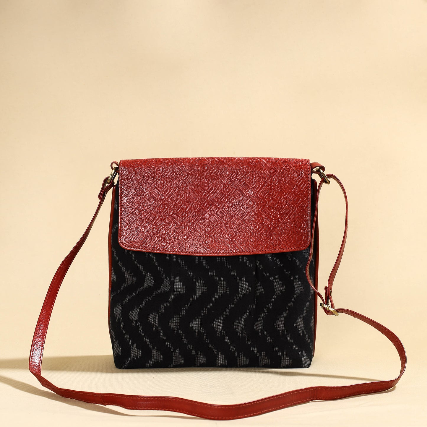 Black - Handcrafted Ikat Fabric Sling Bag with Embossed Leather Flap