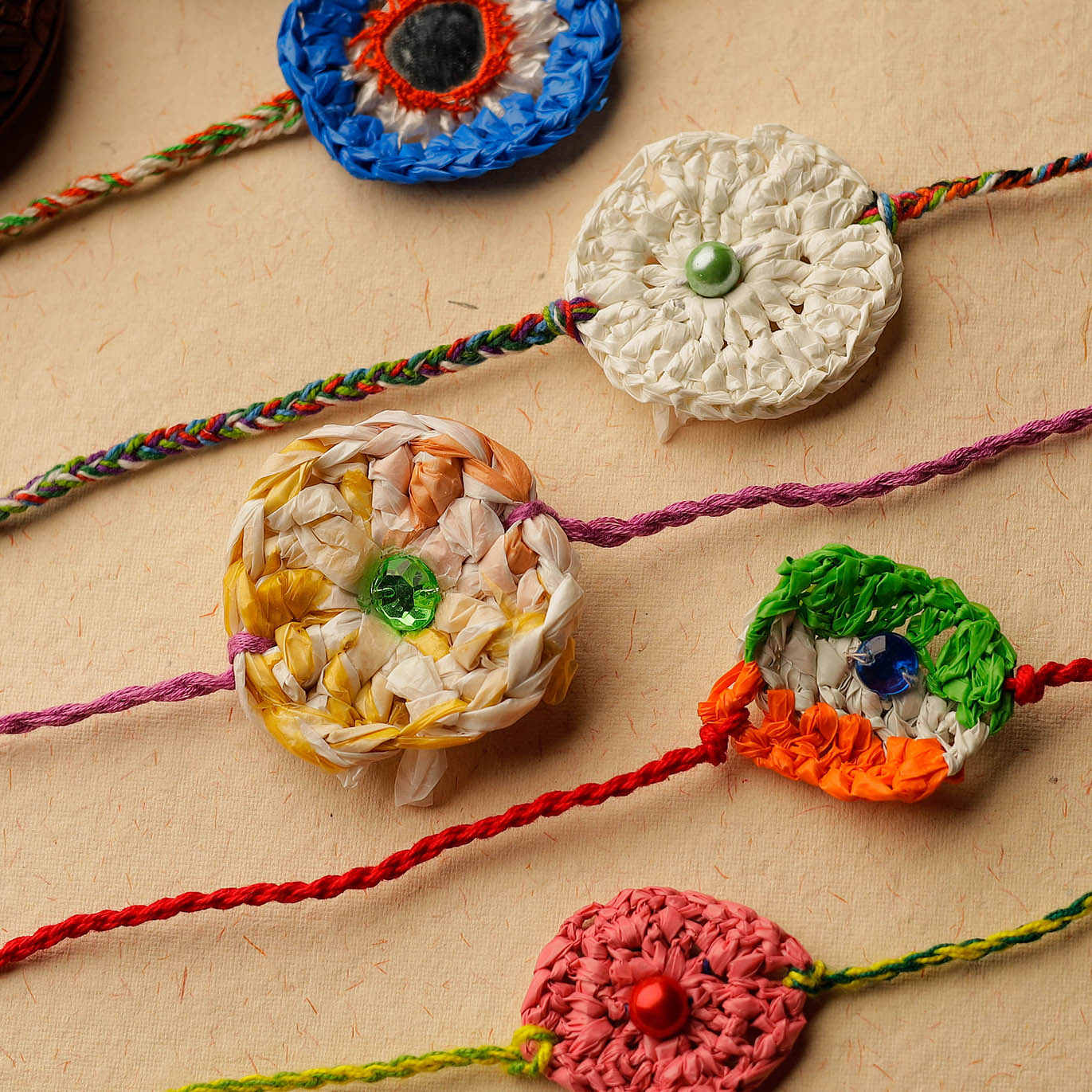 Buy Handmade Upcycled Weave Rakhi by Khamir (Set of 5) 99 Online at iTokri.com