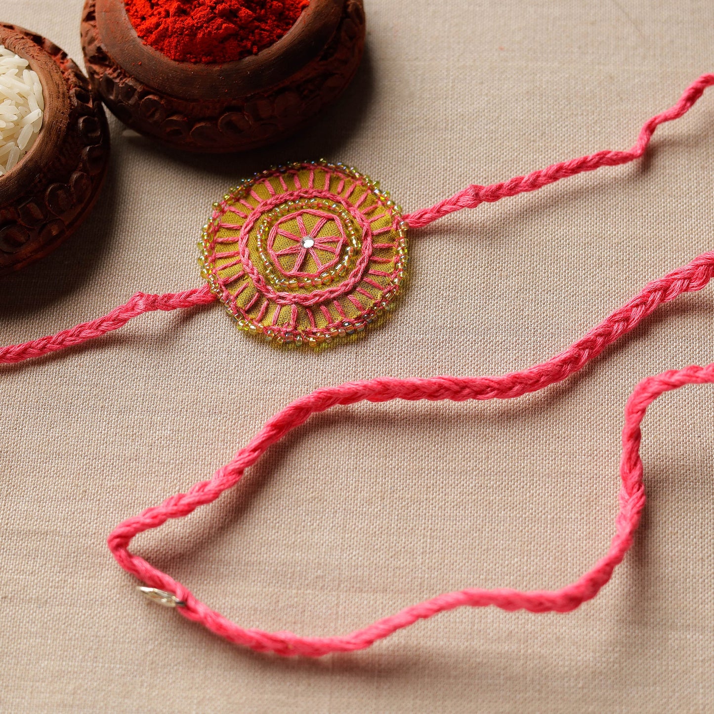 Handmade Beads & Thread Embroidered Reusable Rakhi by Neeli Titlee