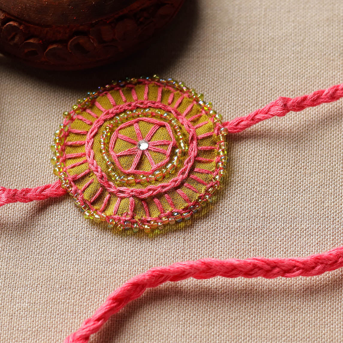 Handmade Beads & Thread Embroidered Reusable Rakhi by Neeli Titlee