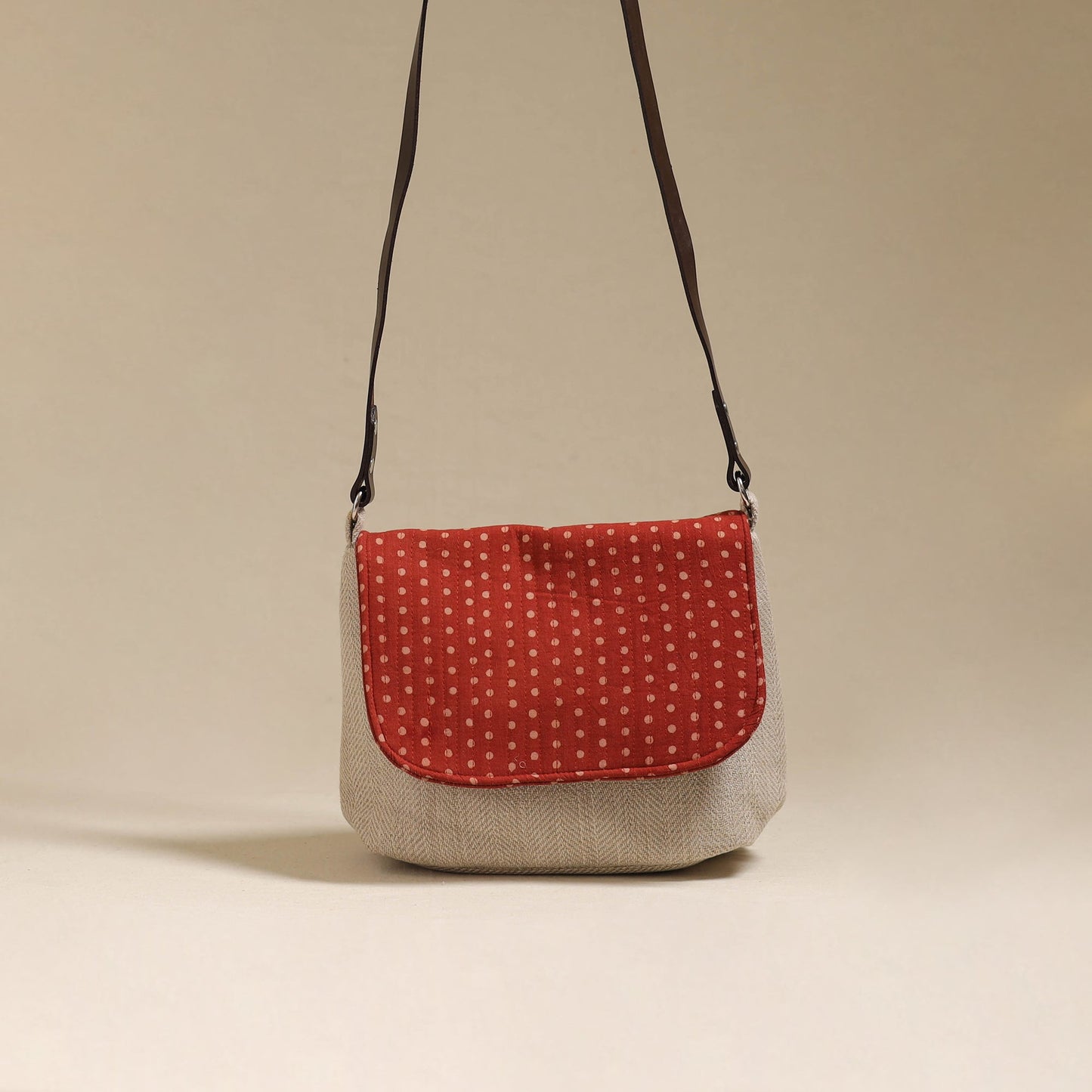 Handcrafted quilted ajrakh block printed fabric sling bag