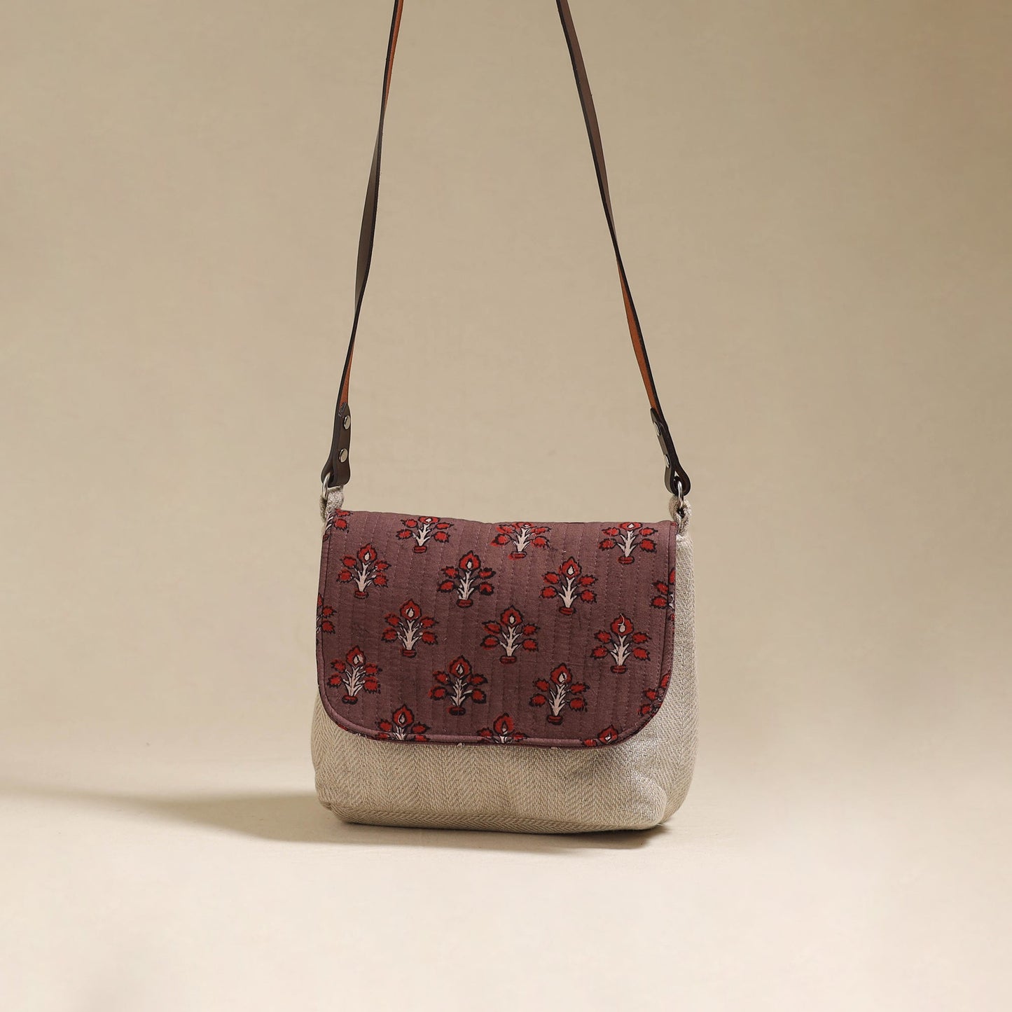Handcrafted quilted ajrakh block printed fabric sling bag