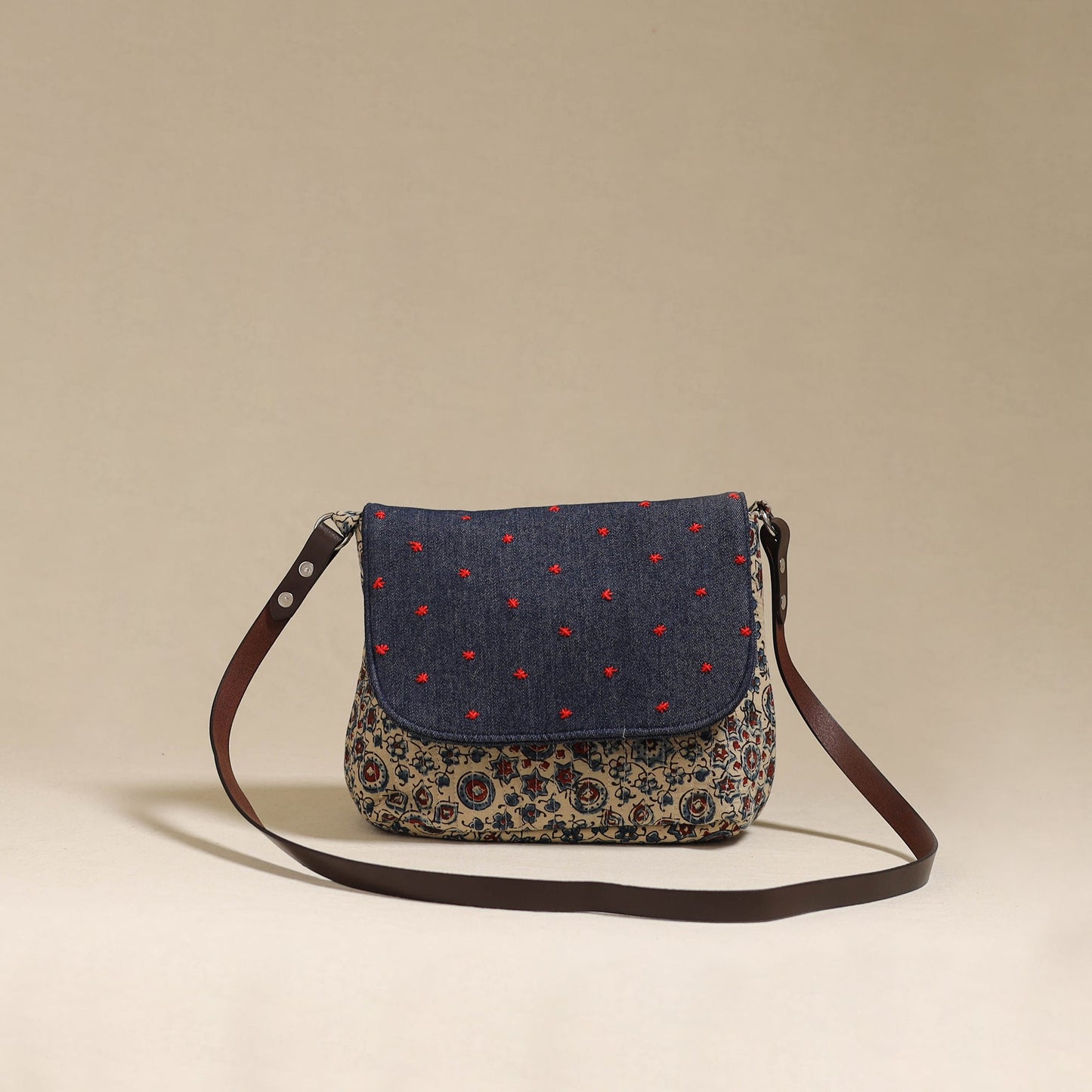 Handcrafted quilted ajrakh block printed fabric sling bag