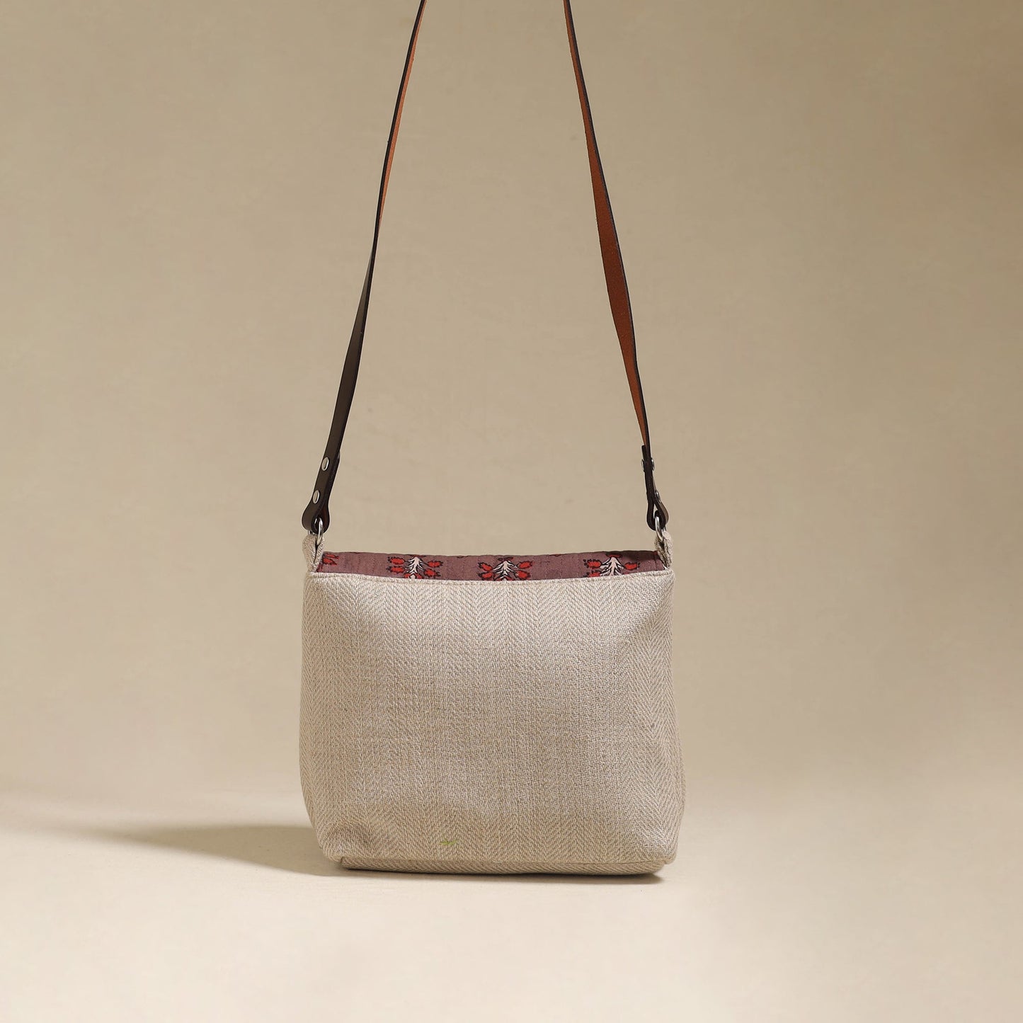 Handcrafted quilted ajrakh block printed fabric sling bag