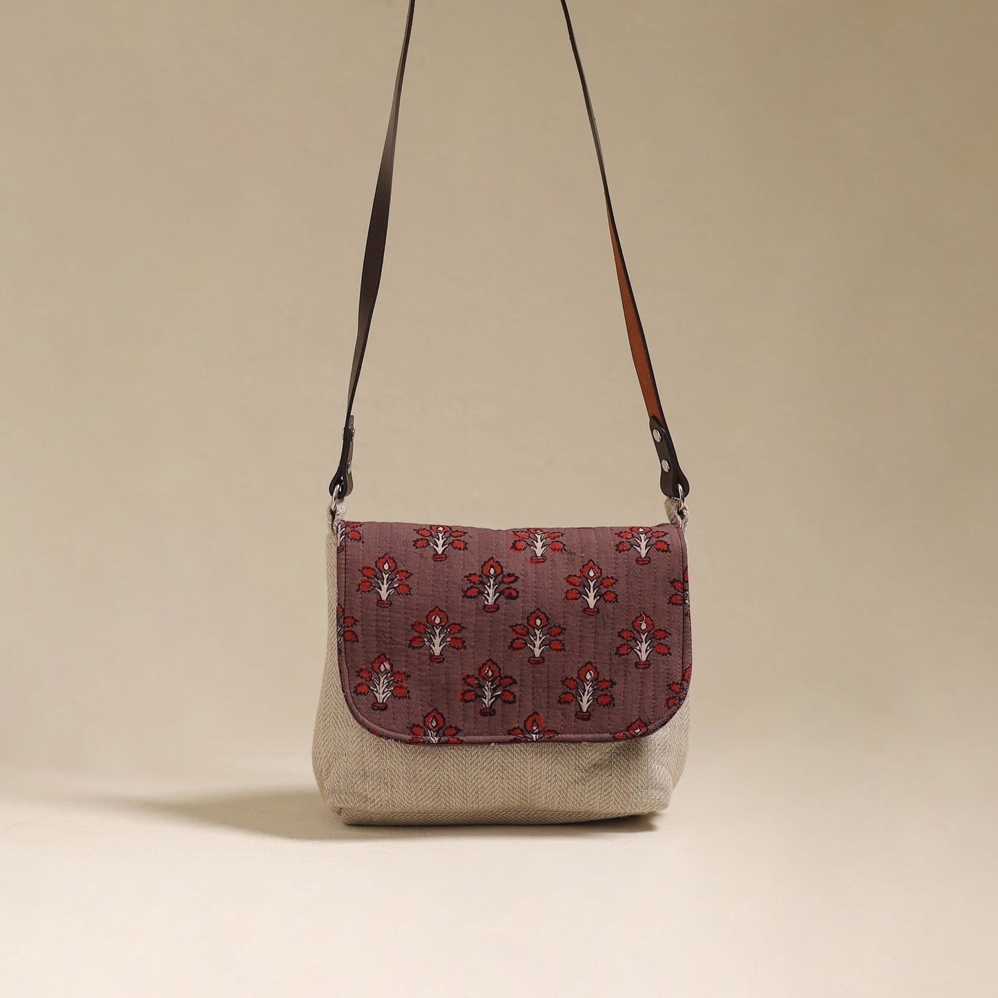 Handcrafted quilted ajrakh block printed fabric sling bag