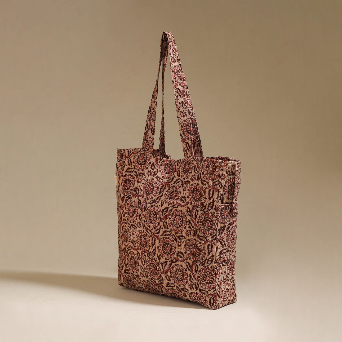 Handcrafted quilted kalamkari block printed fabric tote bag