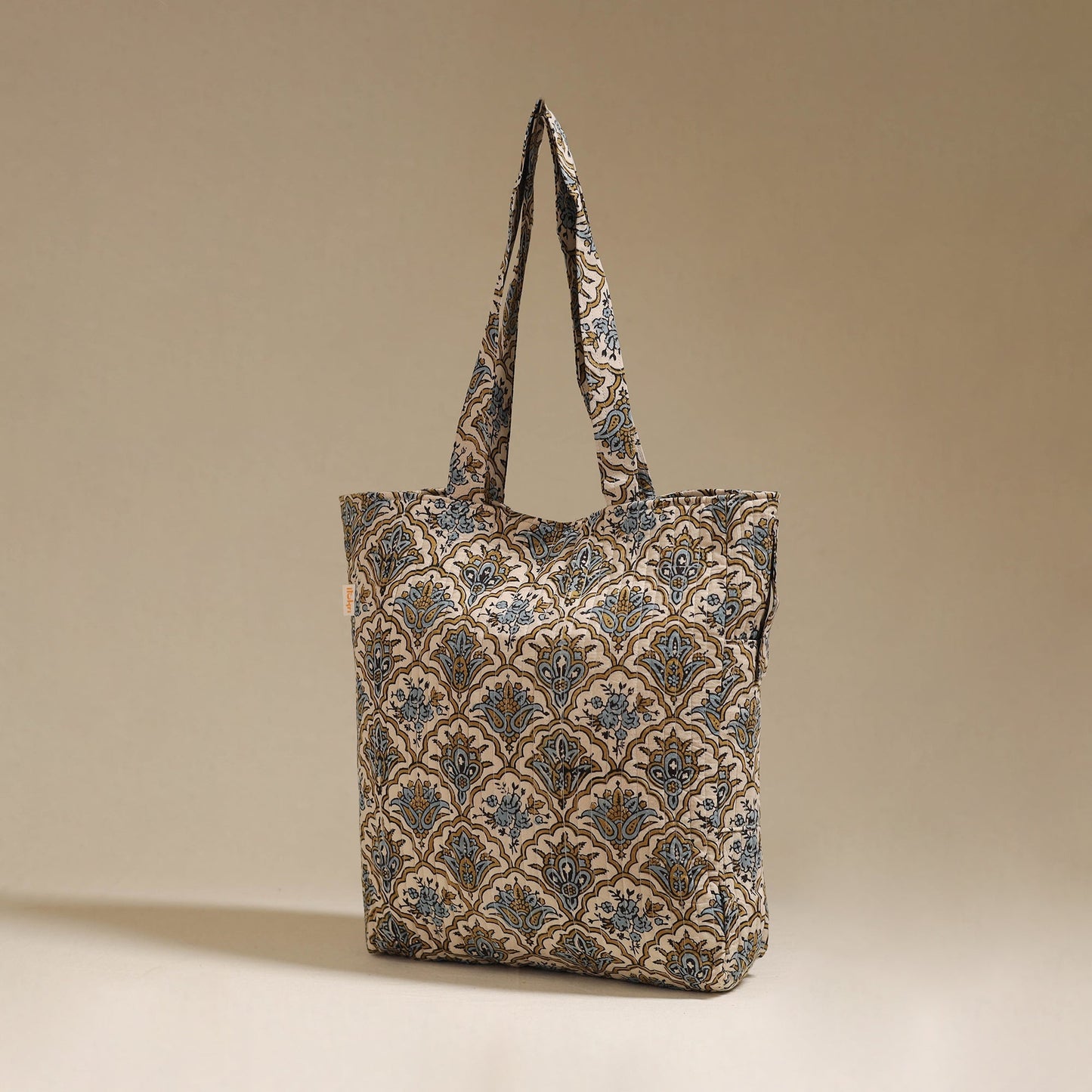 Handcrafted quilted kalamkari block printed fabric tote bag