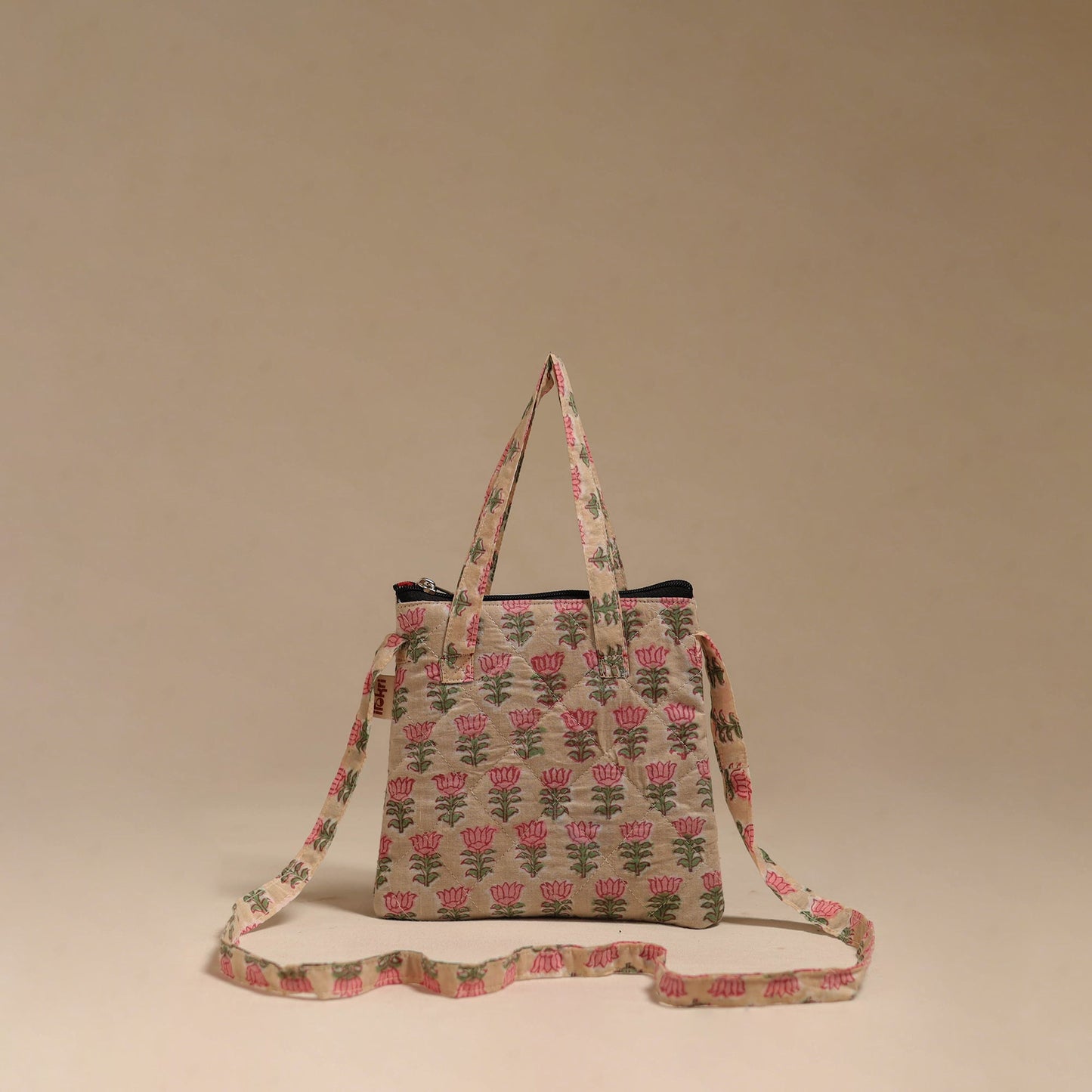 Handcrafted quilted sling bag 11