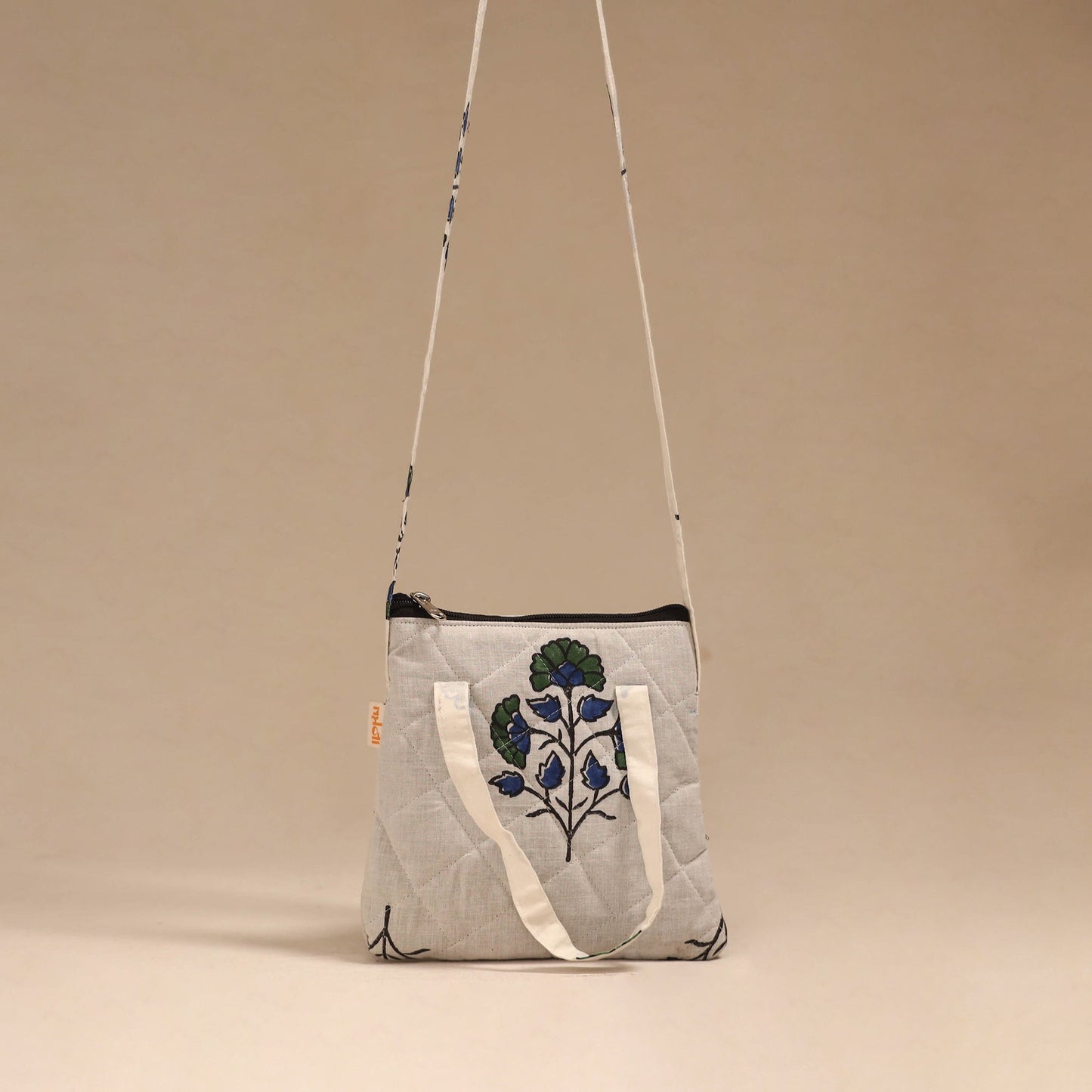 Handcrafted quilted sling bag 13