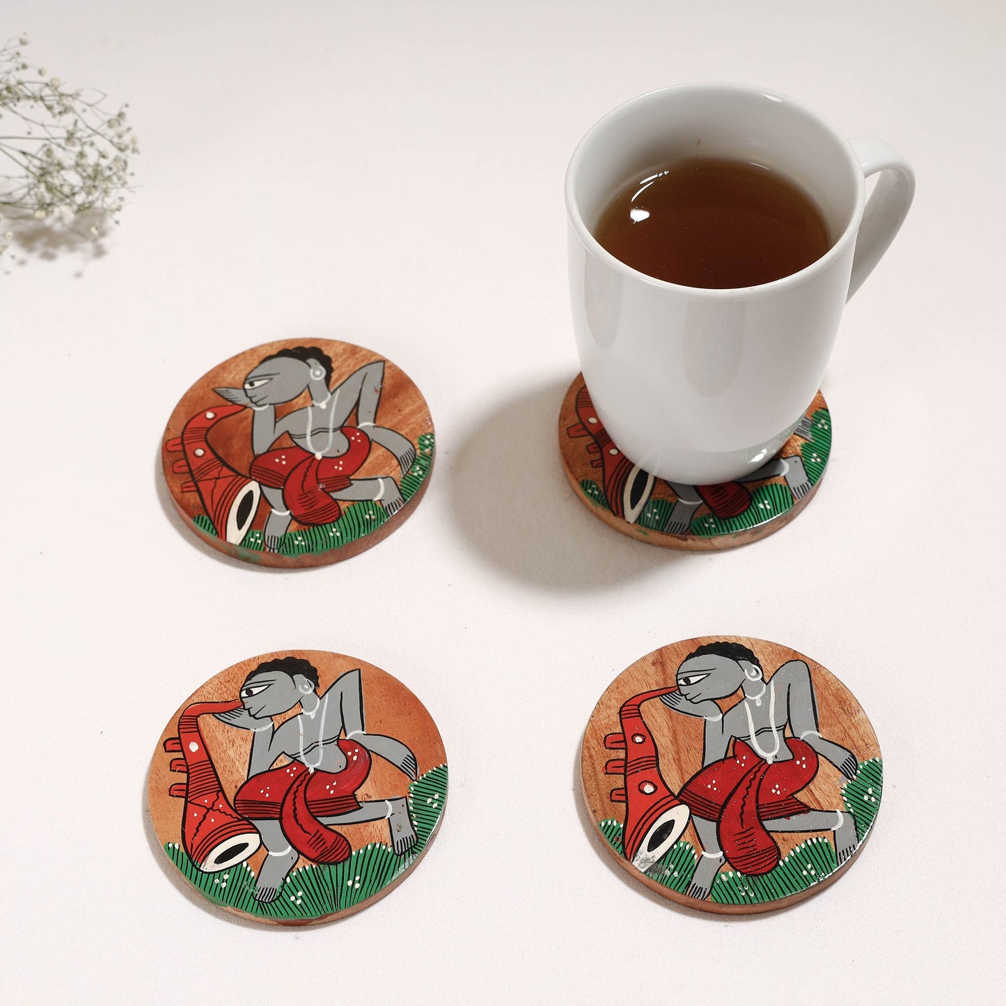 Bengal Patua Handpainted Akashmoni Wooden Coasters Online at iTokri.com