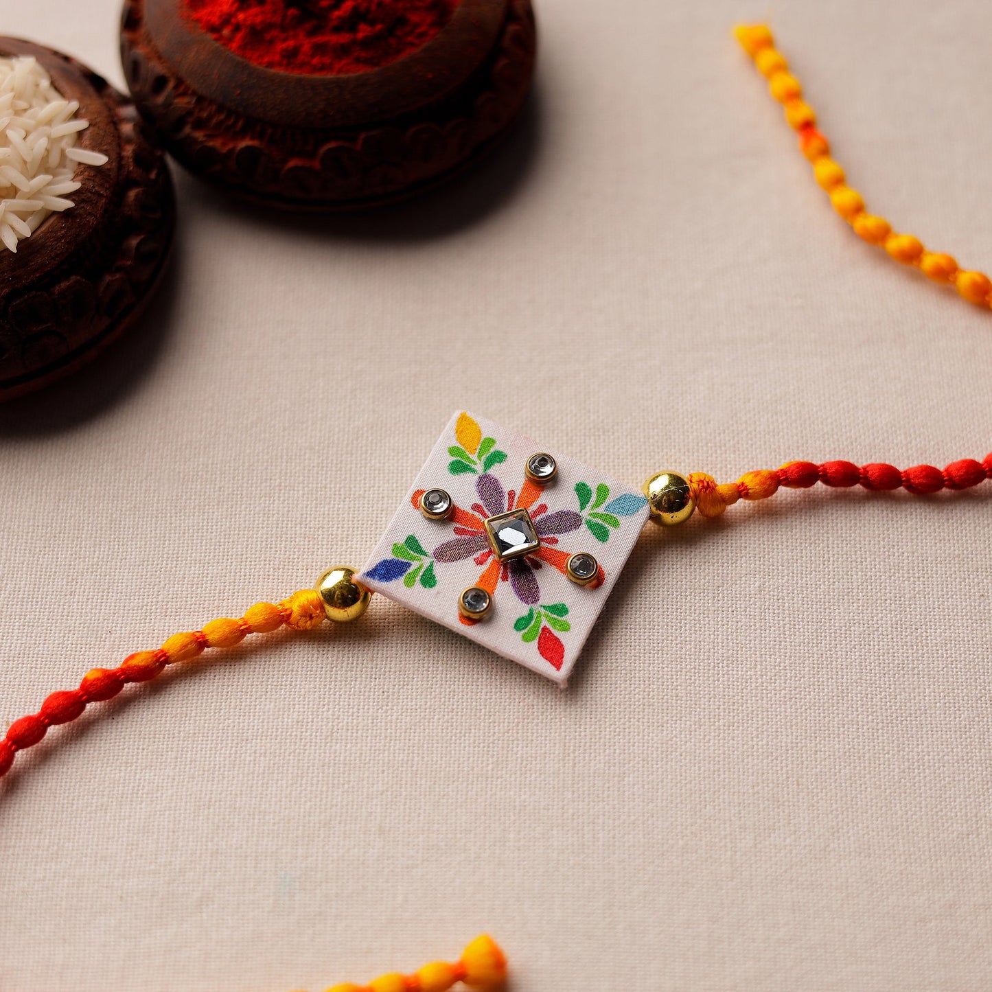 Bishnupur Handpainted Fabric Rakhi 07