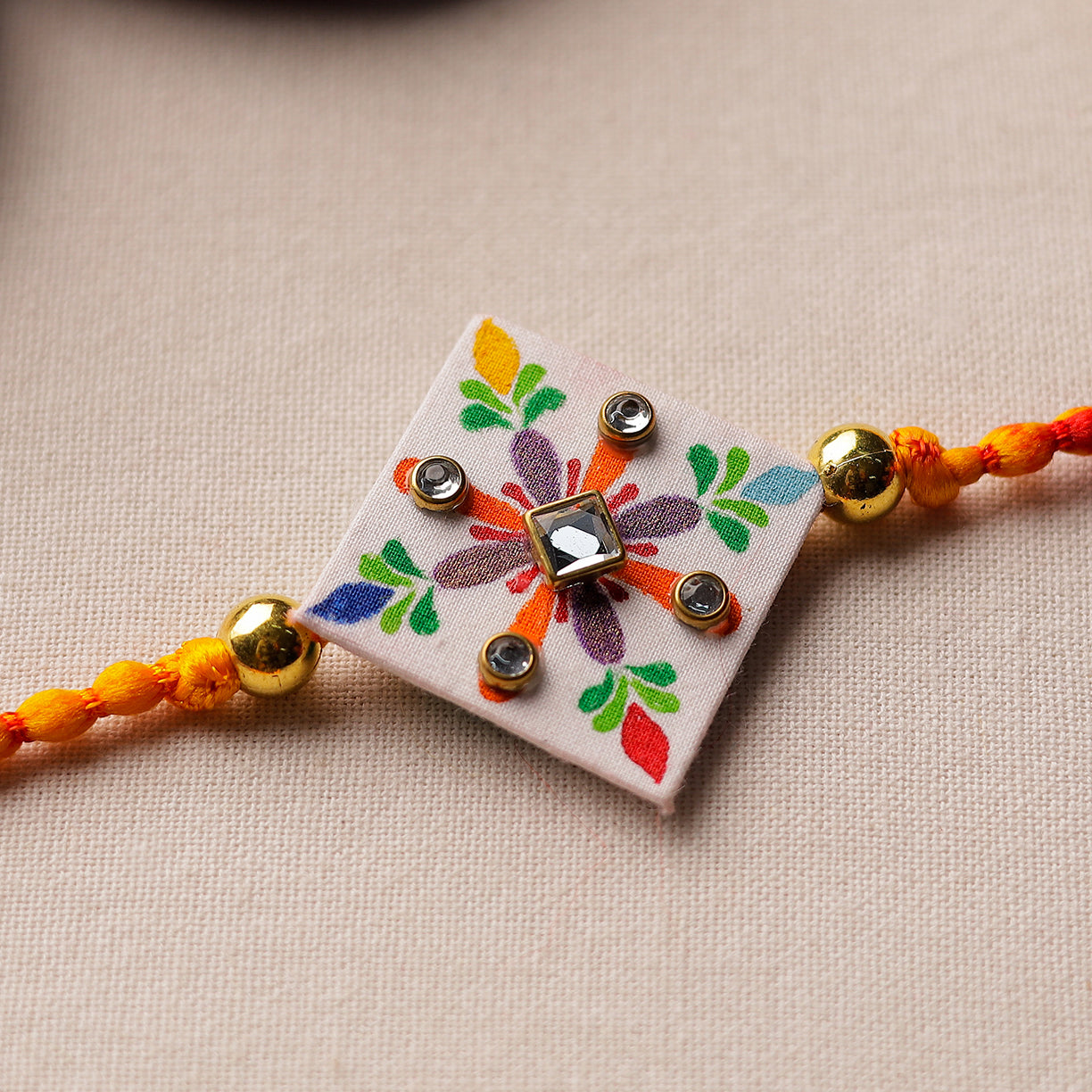 Bishnupur Handpainted Fabric Rakhi 07
