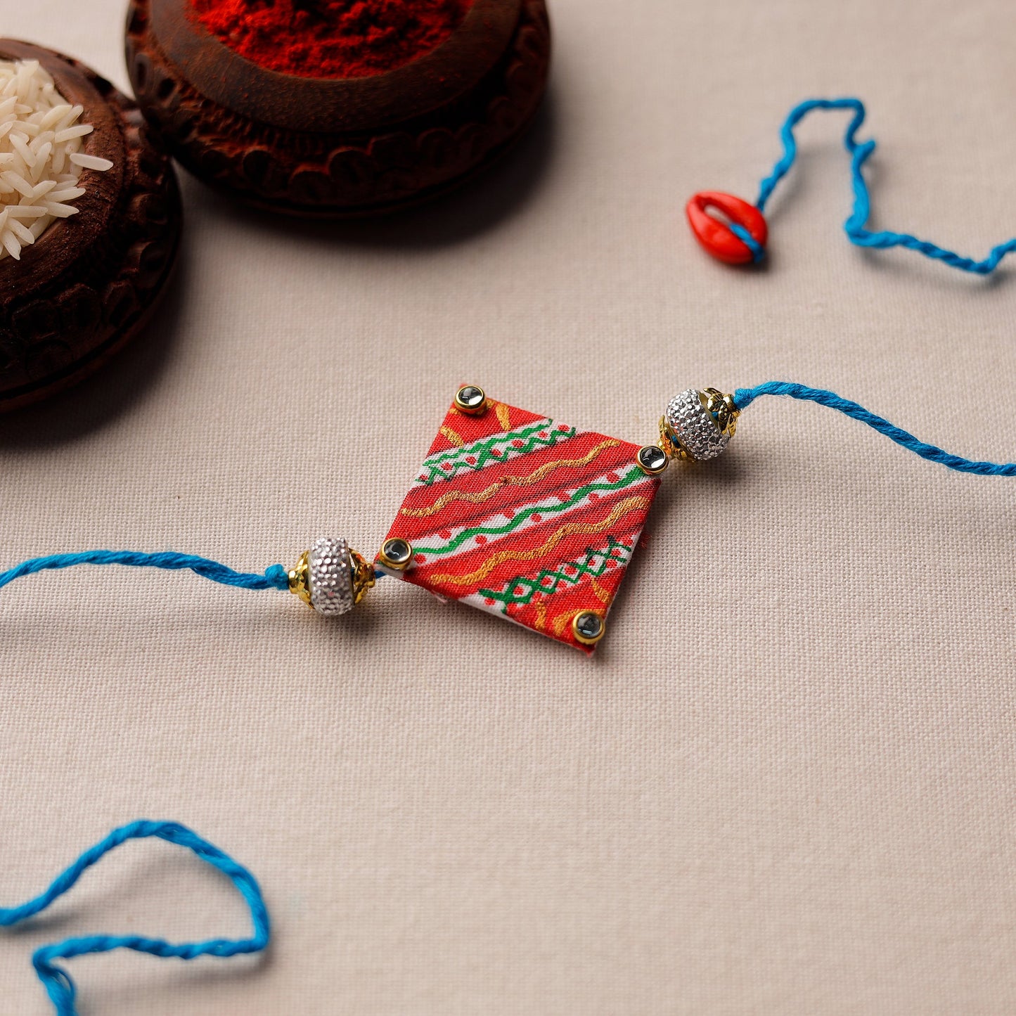 Bishnupur Handpainted Fabric Rakhi 09