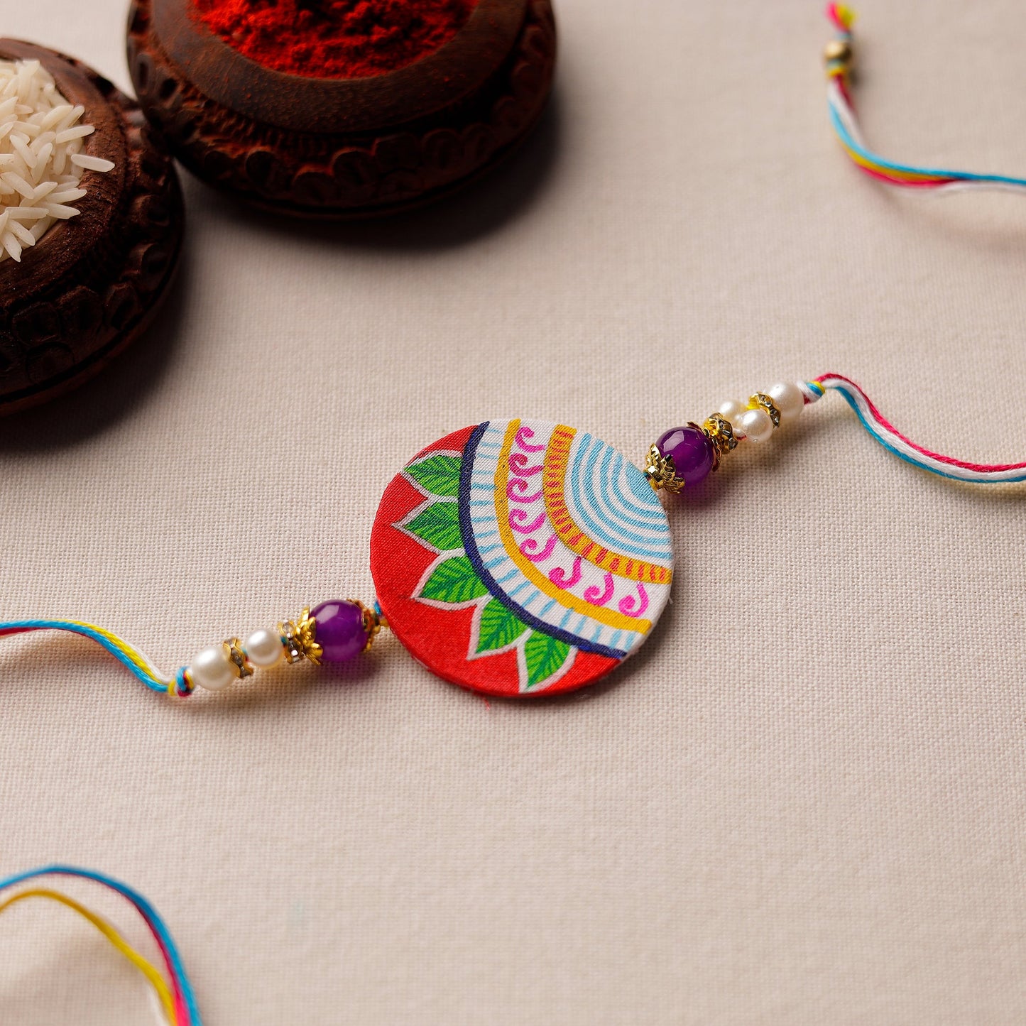 Bishnupur Handpainted Fabric Rakhi 17