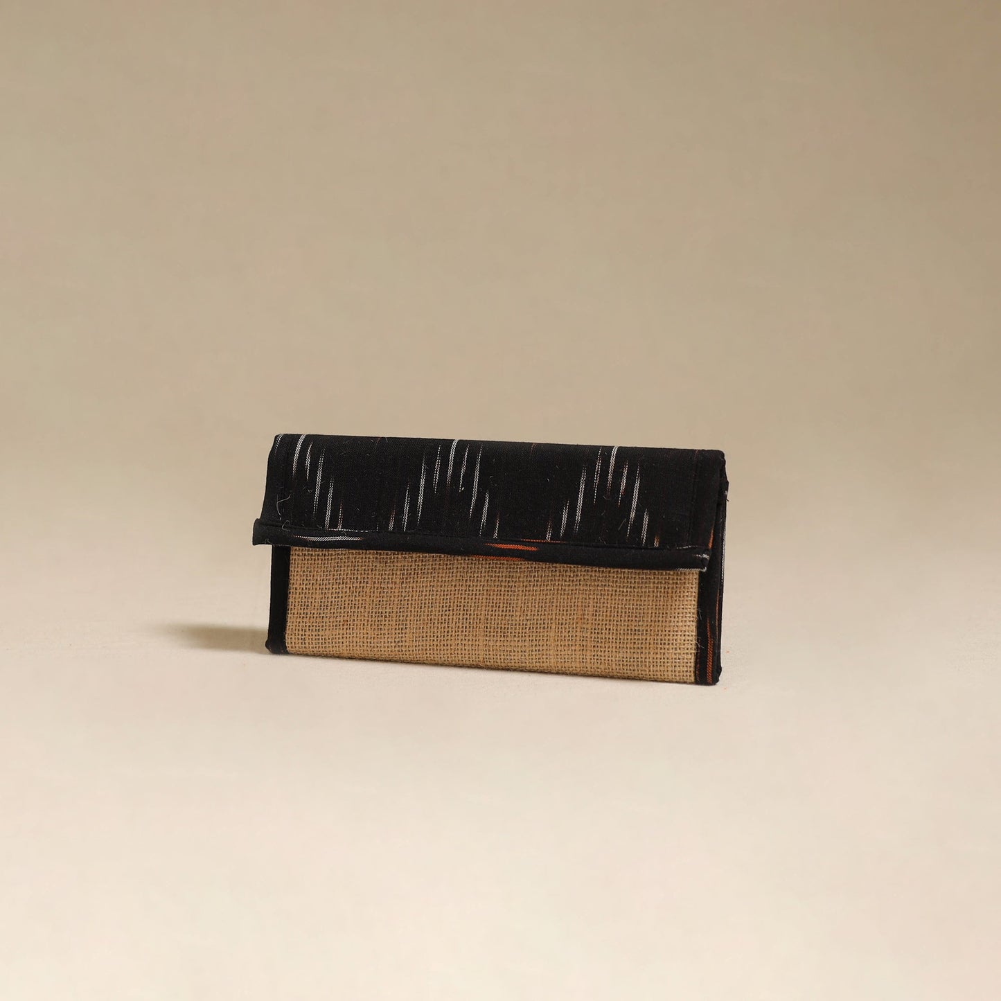 Black - handcrafted ikat fabric jute clutch / wallet