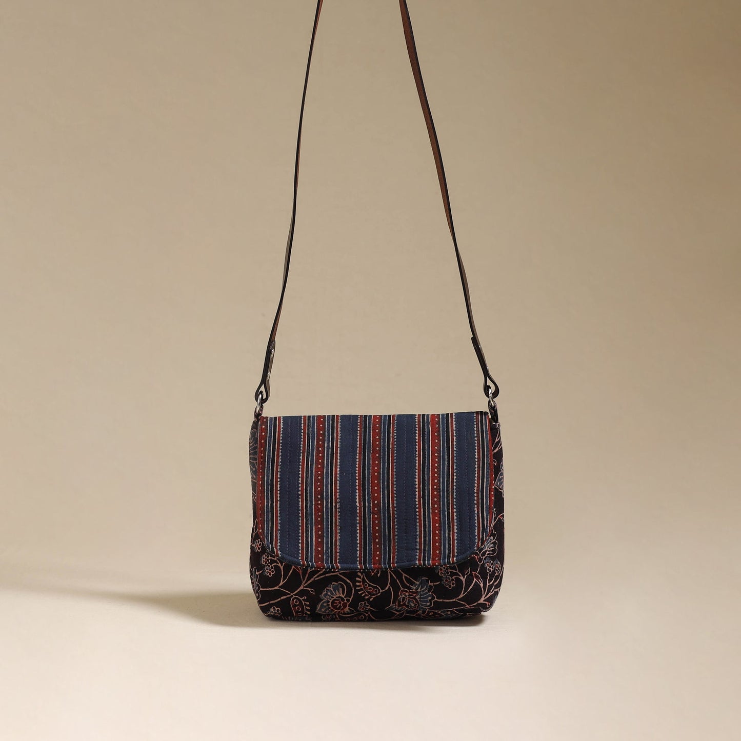 Handcrafted quilted ajrakh block printed fabric sling bag