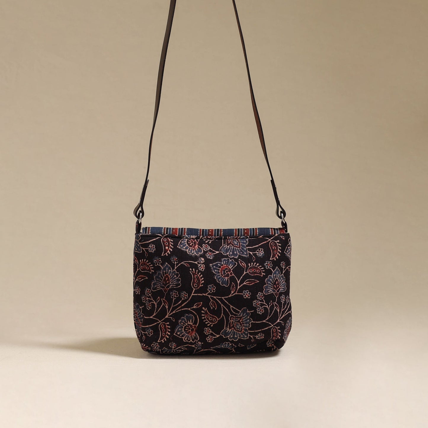 Handcrafted quilted ajrakh block printed fabric sling bag