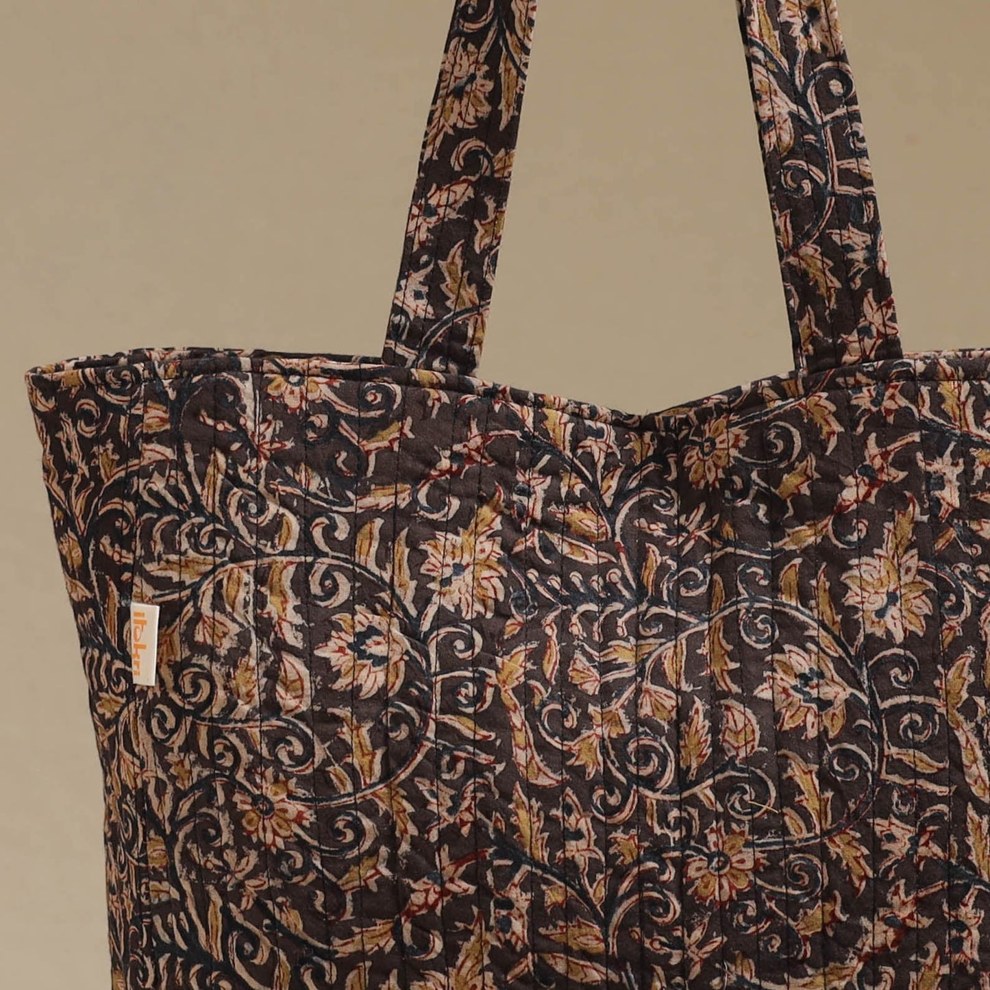 Handcrafted quilted kalamkari block printed fabric tote bag