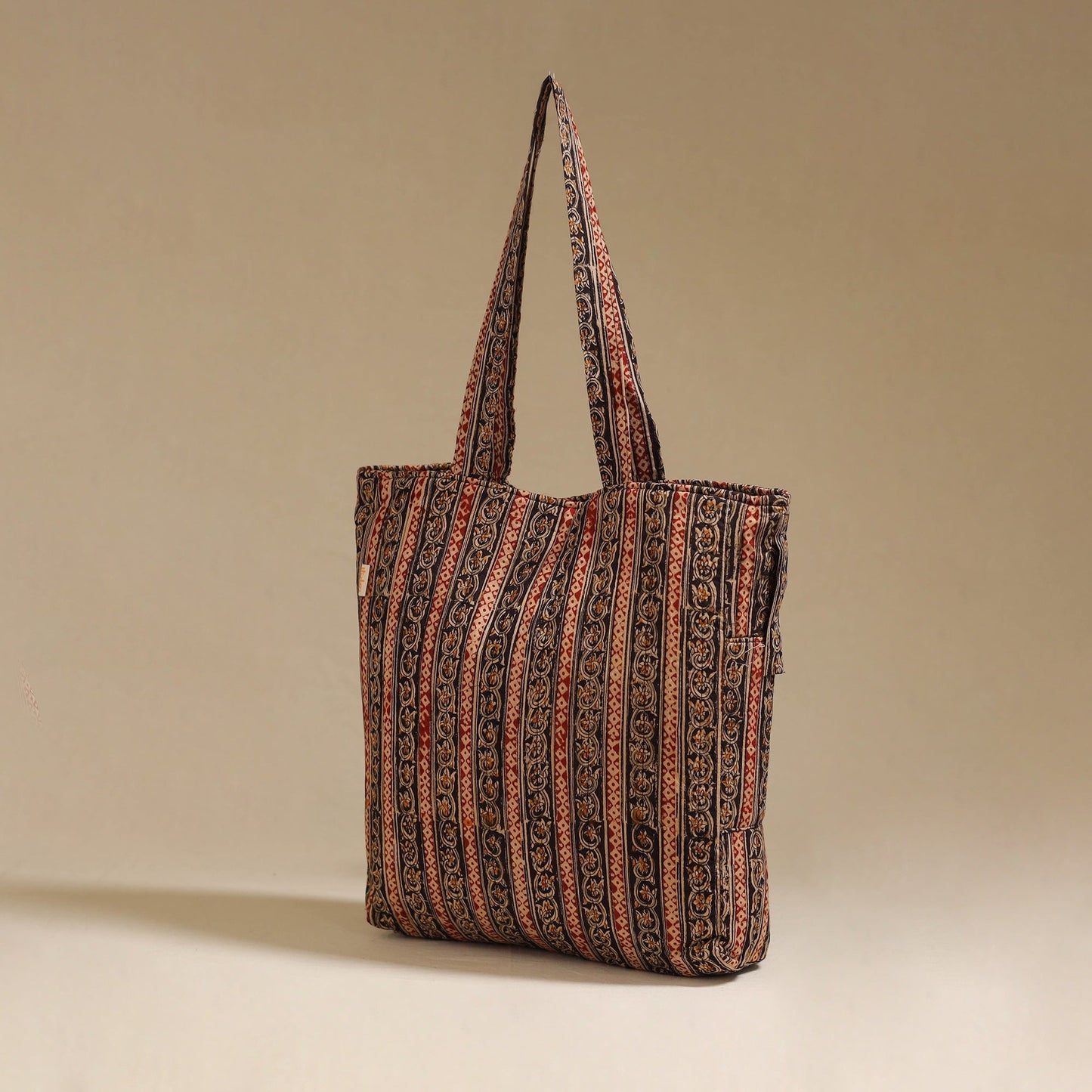 Handcrafted quilted kalamkari block printed fabric tote bag