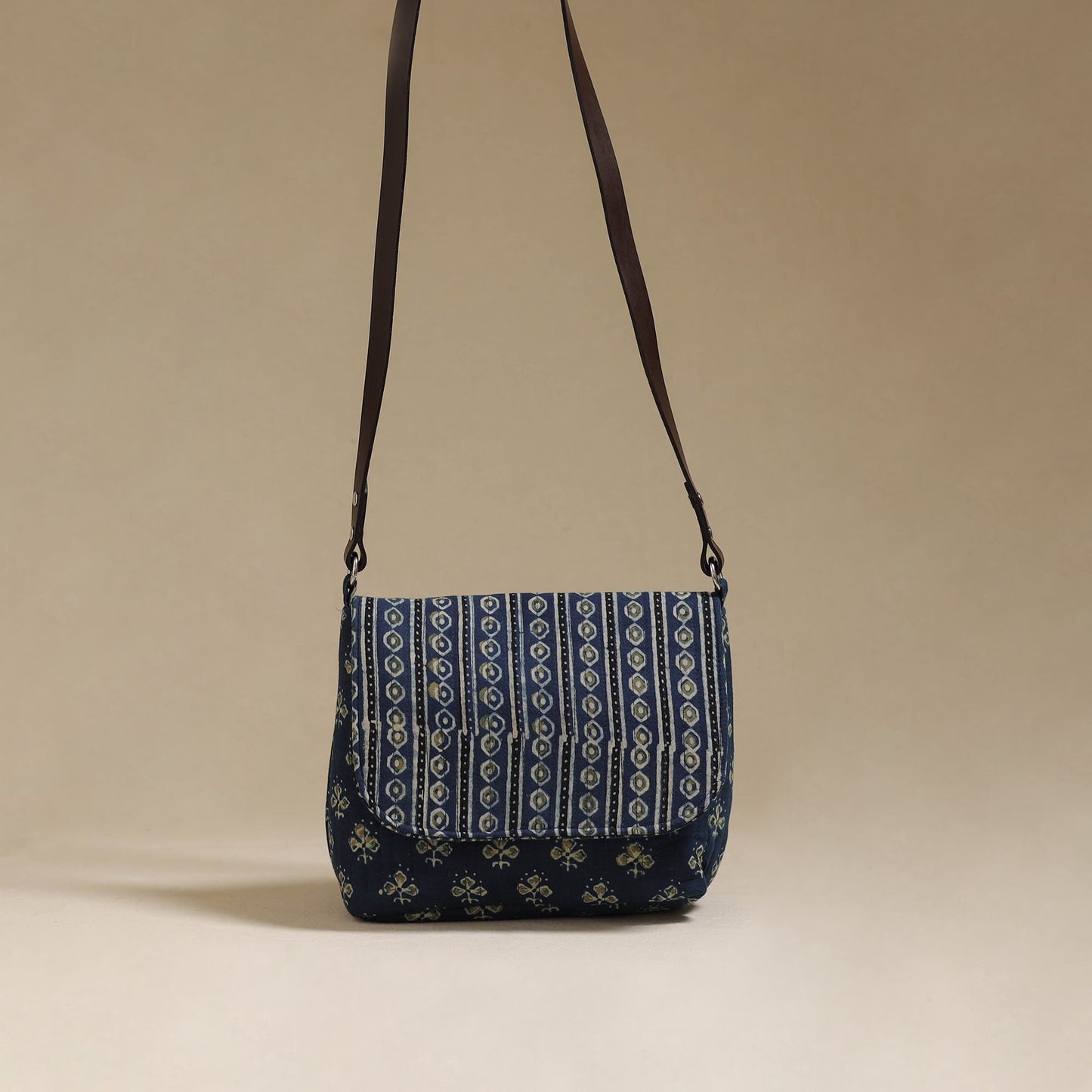 Handcrafted quilted ajrakh block printed fabric sling bag