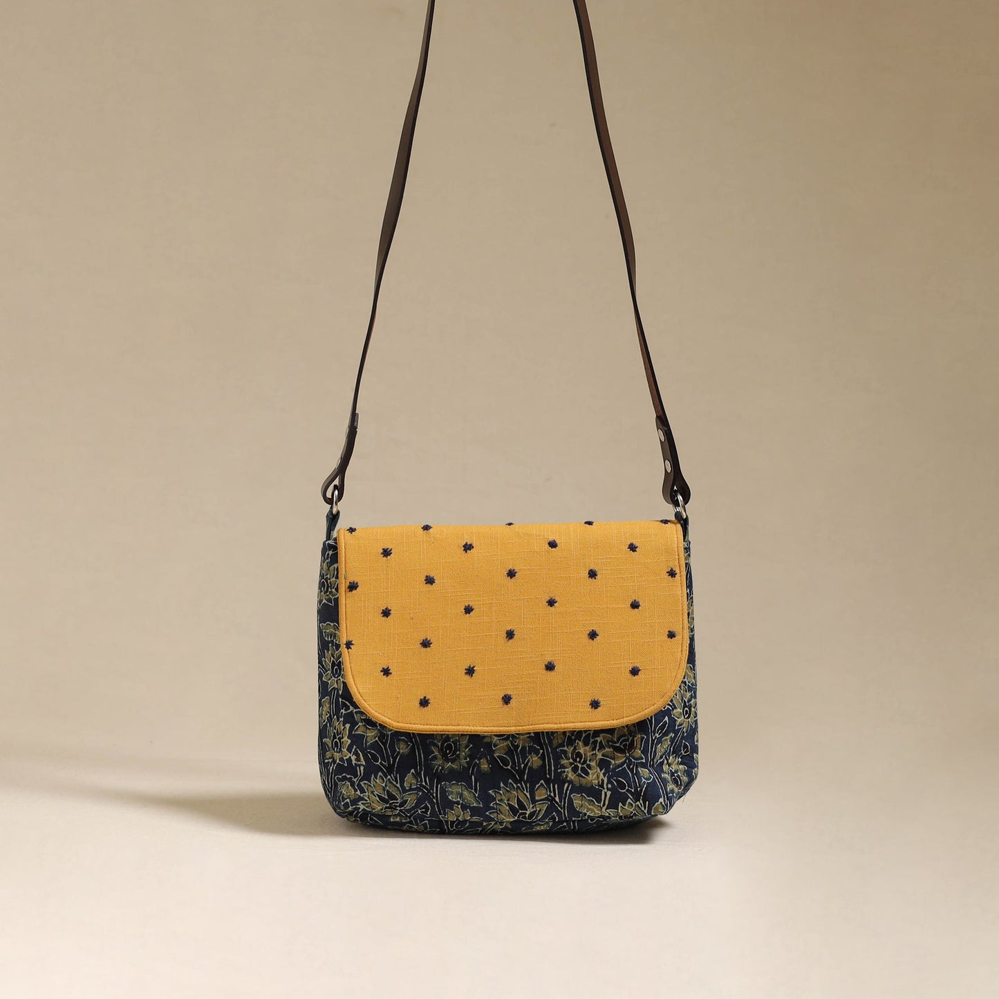 Handcrafted quilted ajrakh block printed fabric sling bag