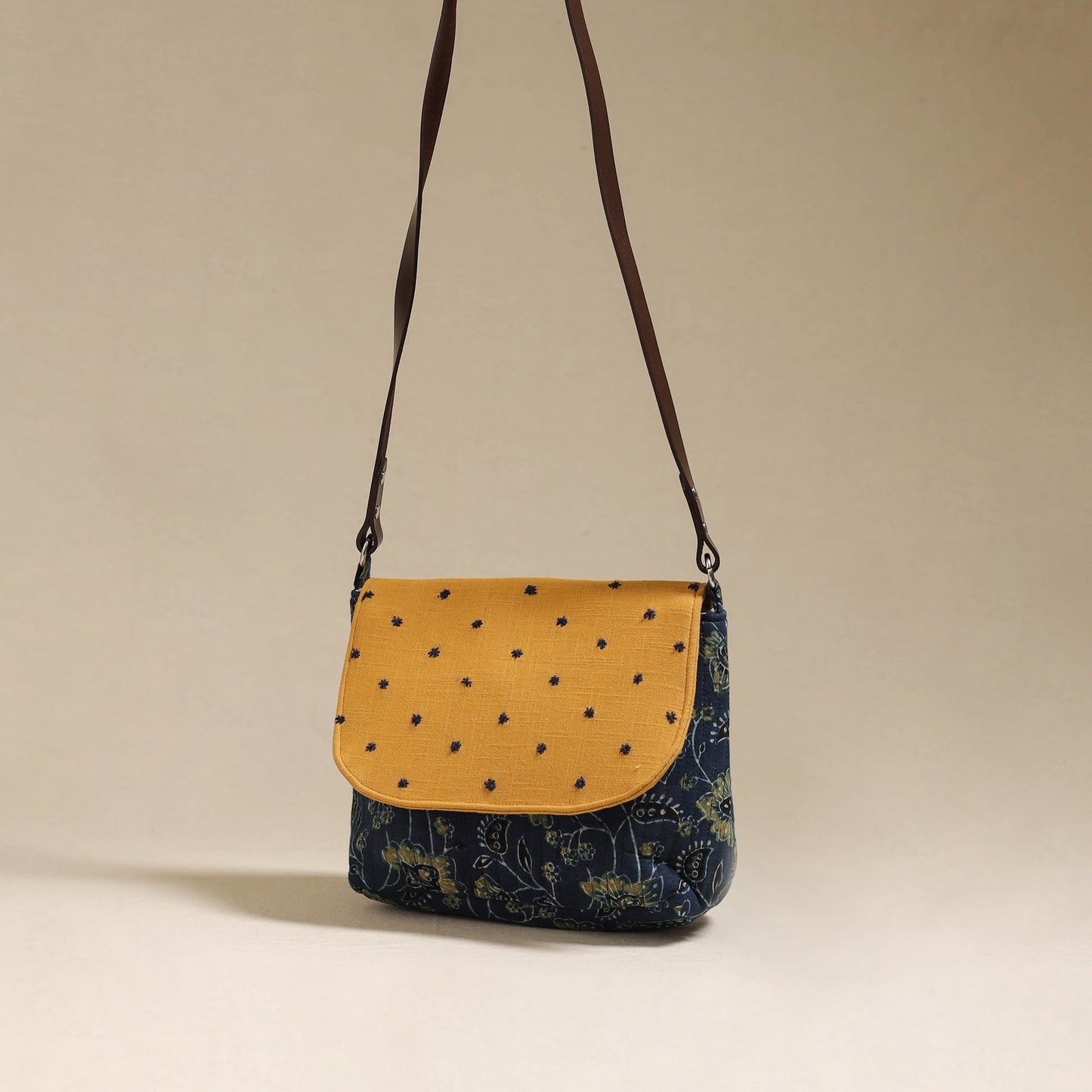 Handcrafted quilted ajrakh block printed fabric sling bag