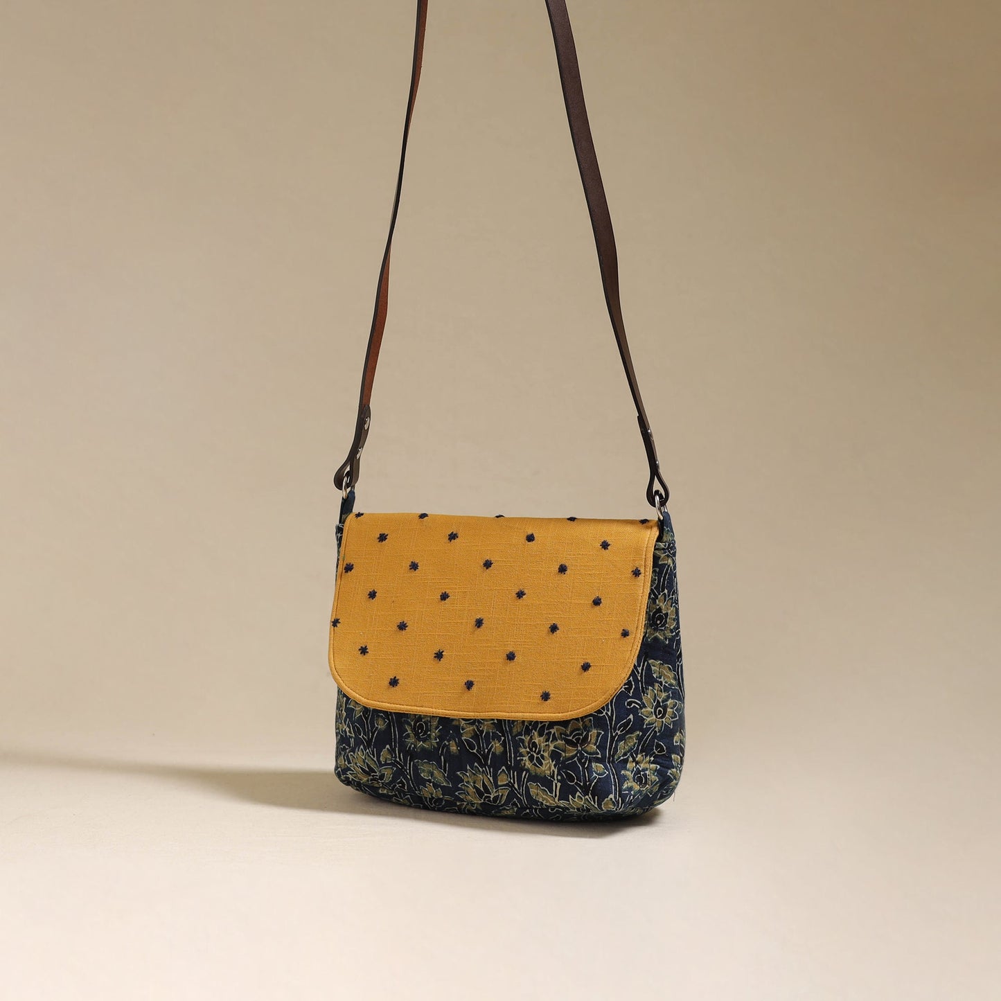 Handcrafted quilted ajrakh block printed fabric sling bag