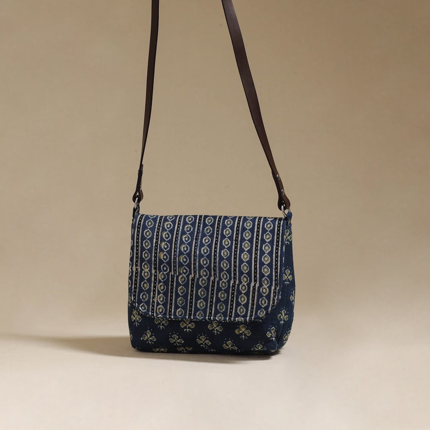 Handcrafted quilted ajrakh block printed fabric sling bag