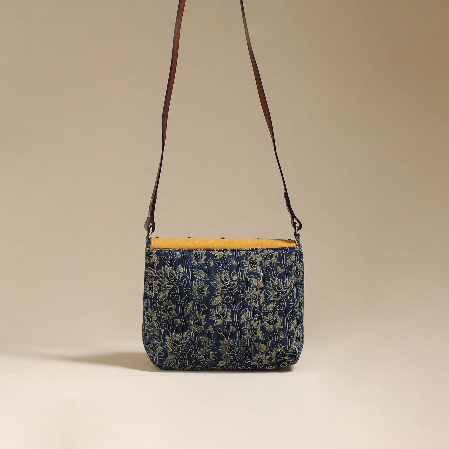 Handcrafted quilted ajrakh block printed fabric sling bag